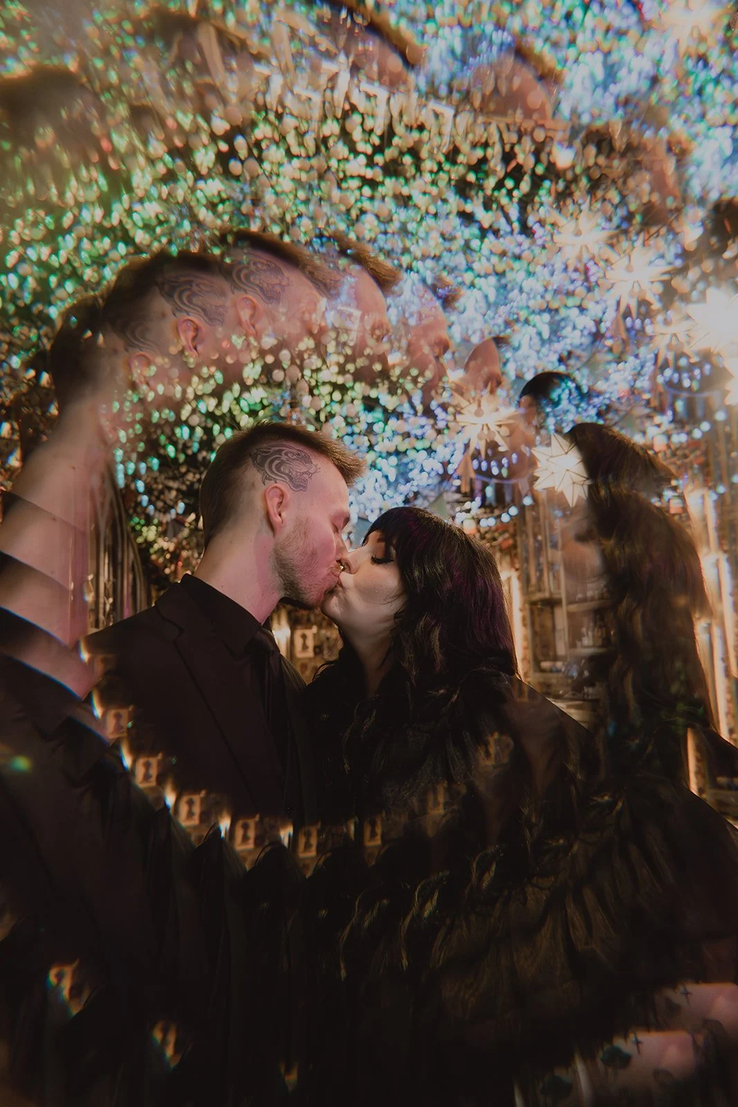 Artsy portrait of a bride and groom kissing inside of Lucky Day in Las Vegas.