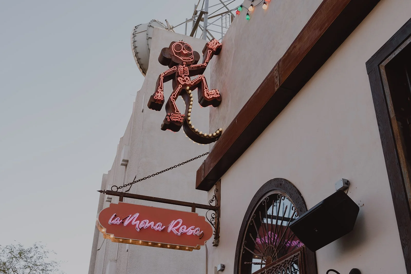 La Mona Rosa Las Vegas exterior with pink monkey neon sign on Fremont Street.