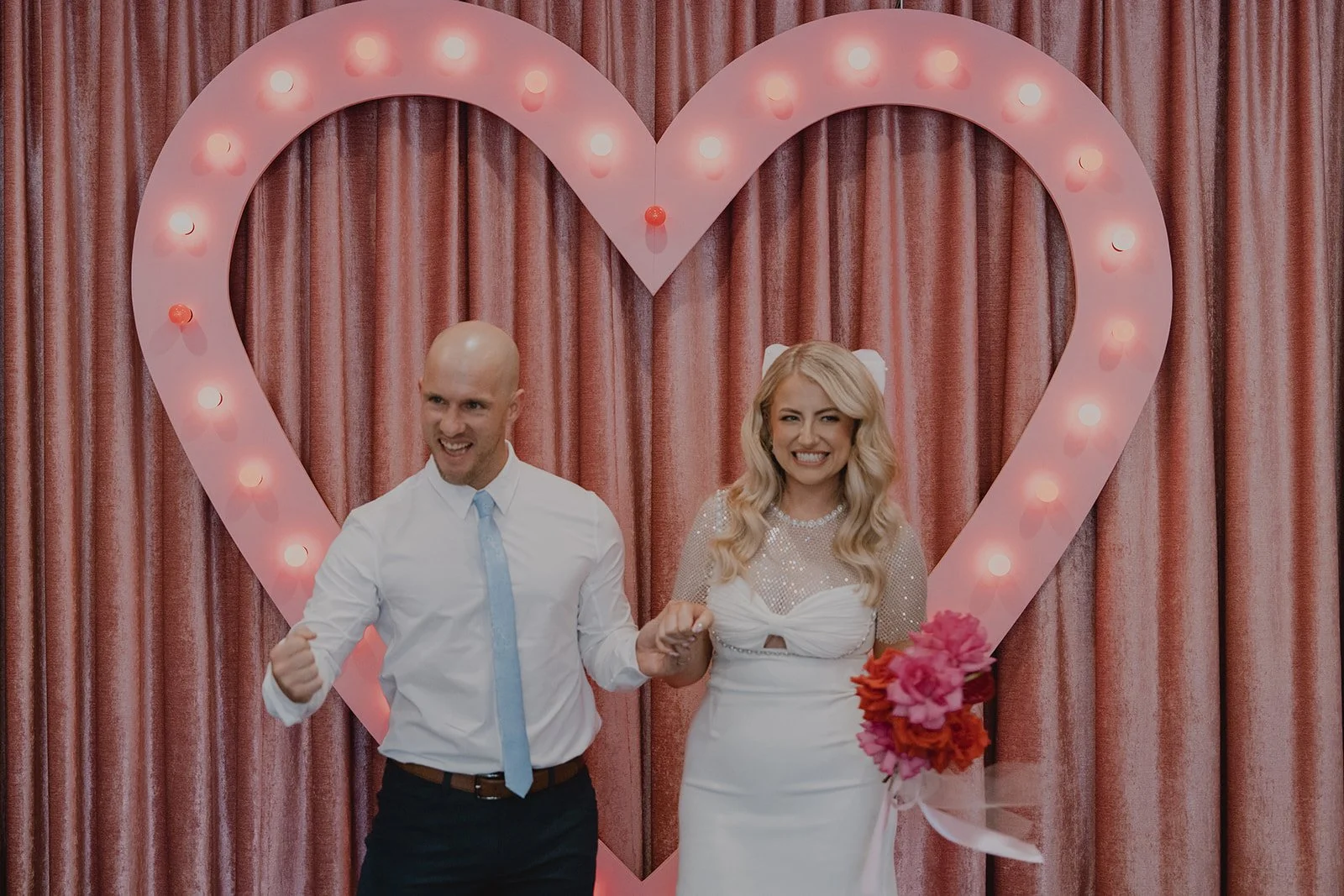Newlyweds celebrating after their ceremony at Sure Thing Chapel in Las Vegas.