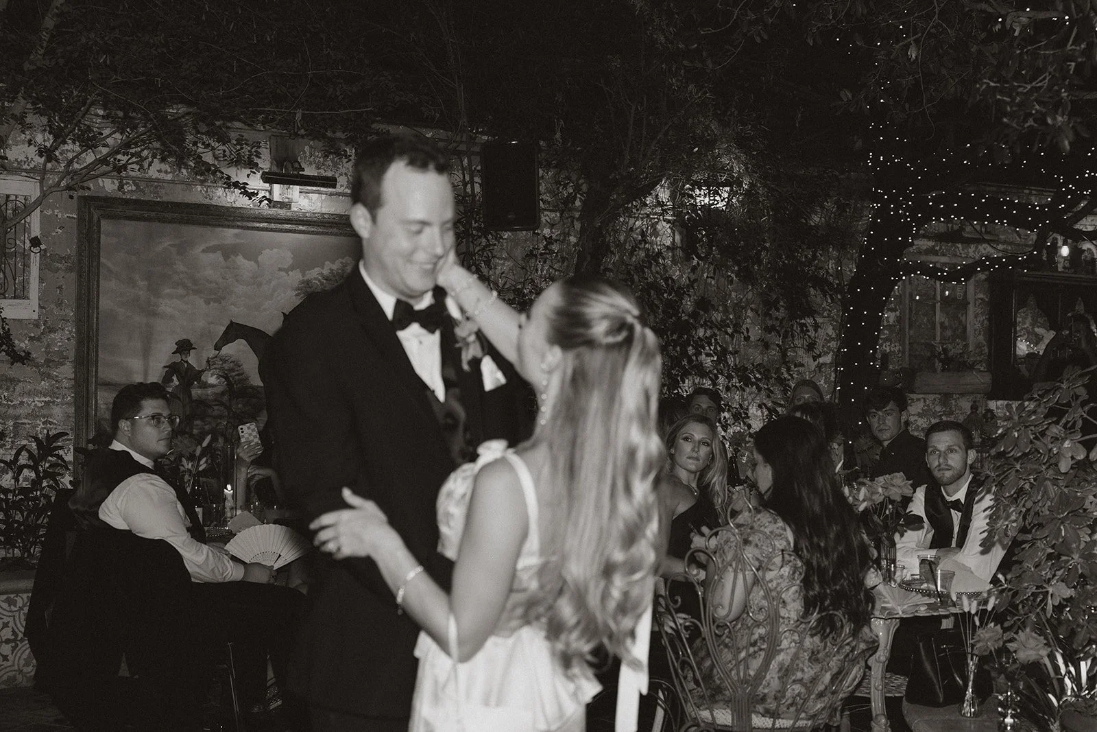 Black and white photo of a bride and groom dancing during their small Las Vegas wedding reception at Park on Fremont.