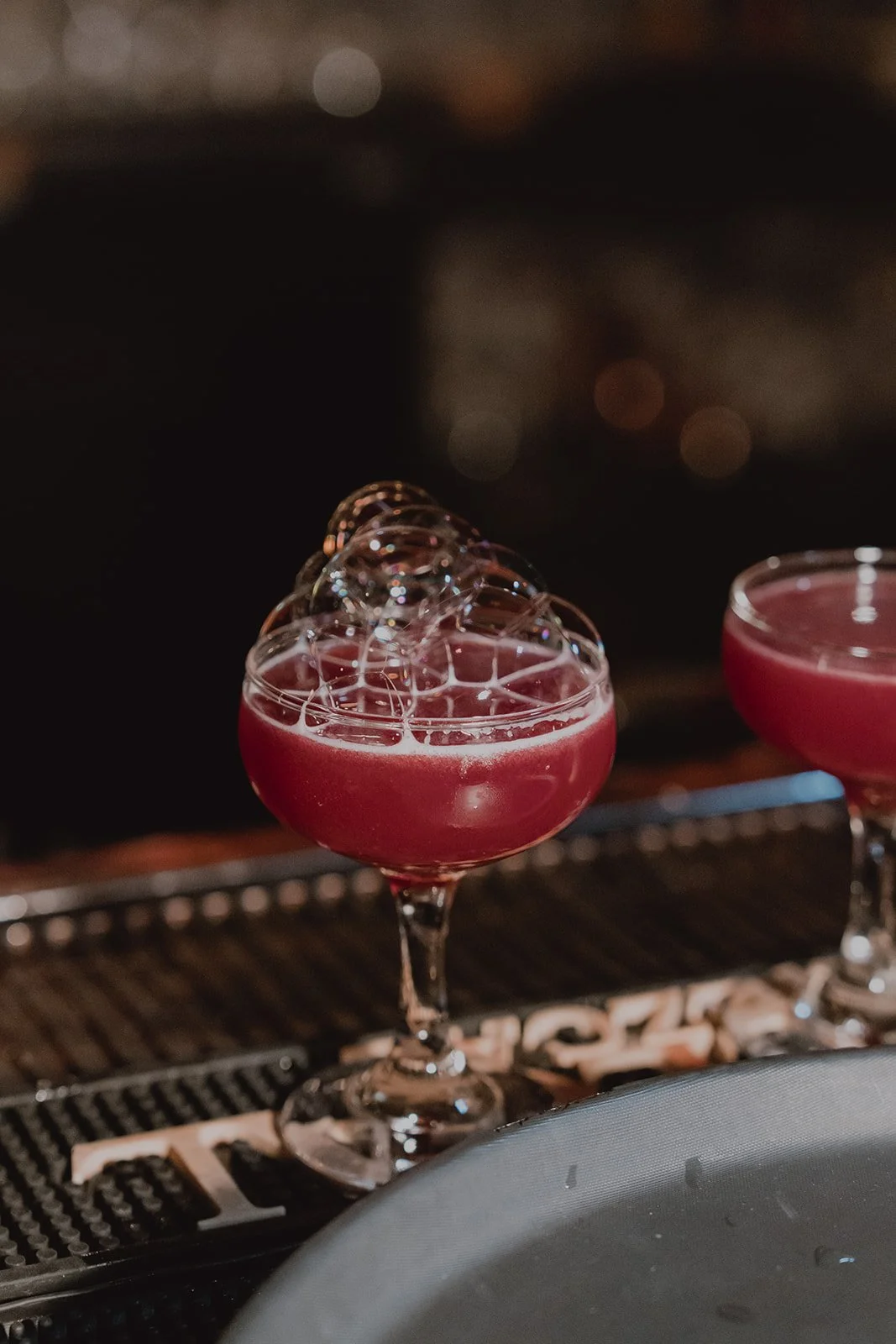Signature drinks displayed at the bar during a Velveteen Rabbit Las Vegas micro wedding reception.