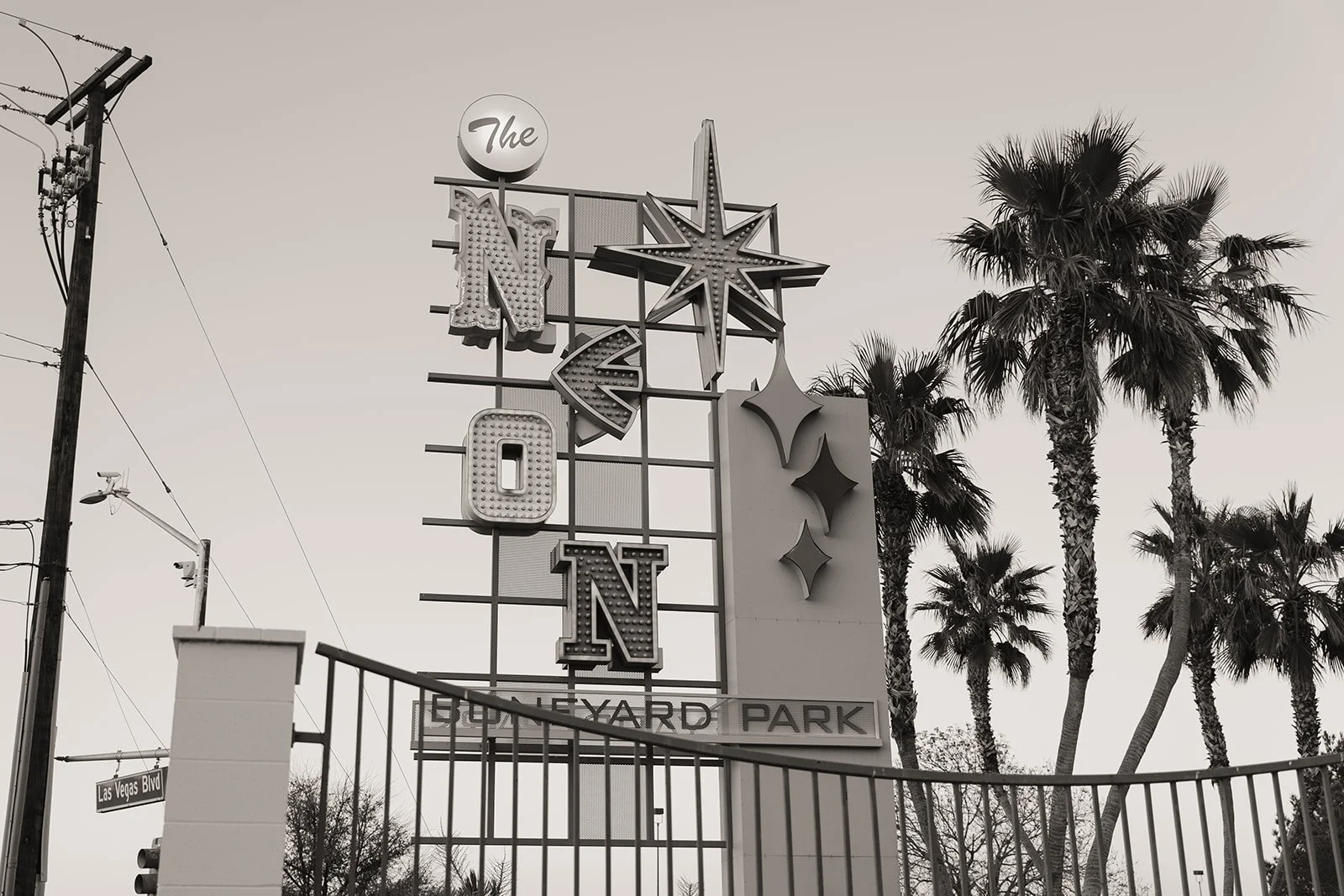 Black and white photo of The Neon Boneyard Park sign at The Neon Museum in Las Vegas.