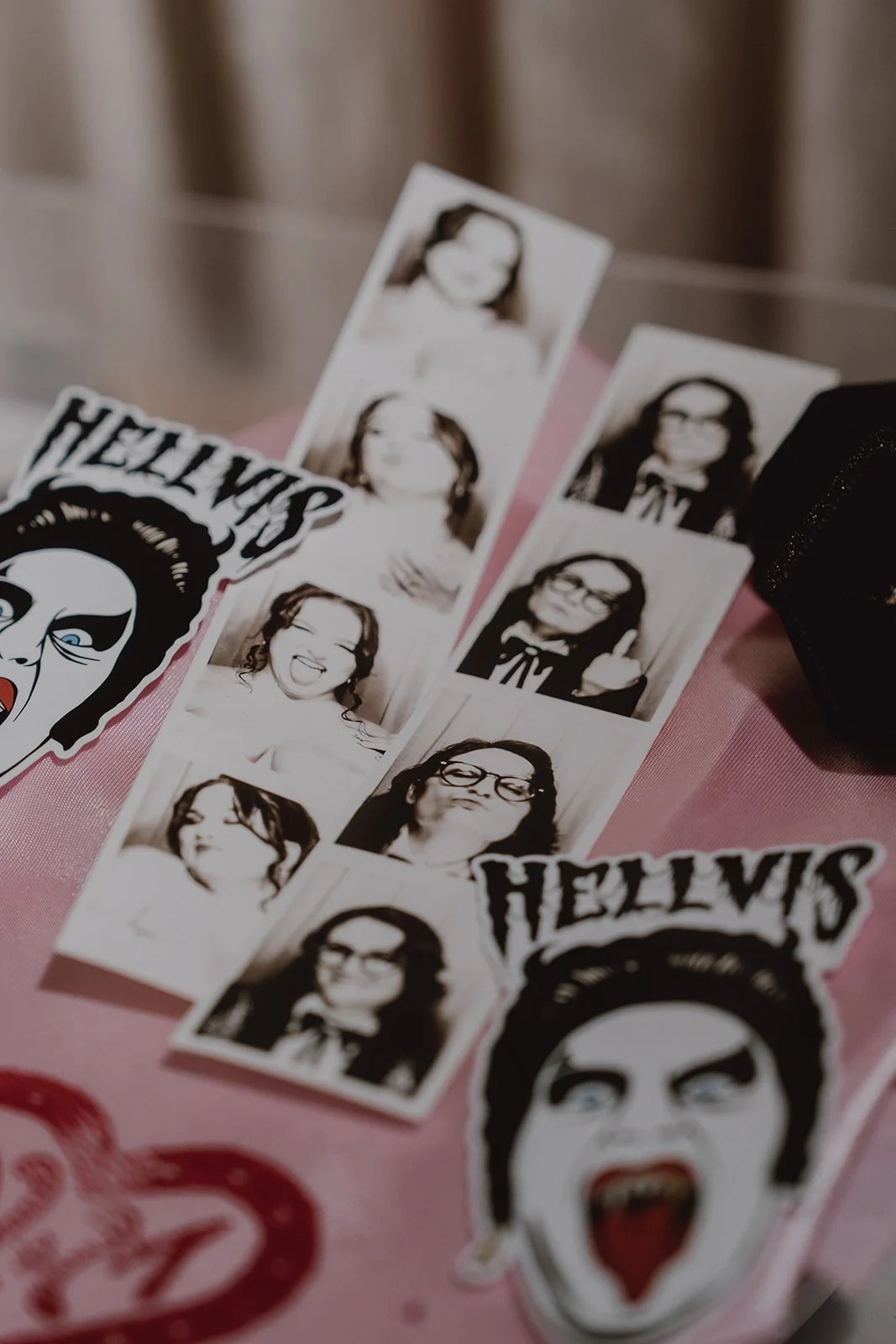 Couples Hellvis stickers and photobooth strips from their Sure Thing Chapel Las Vegas wedding.