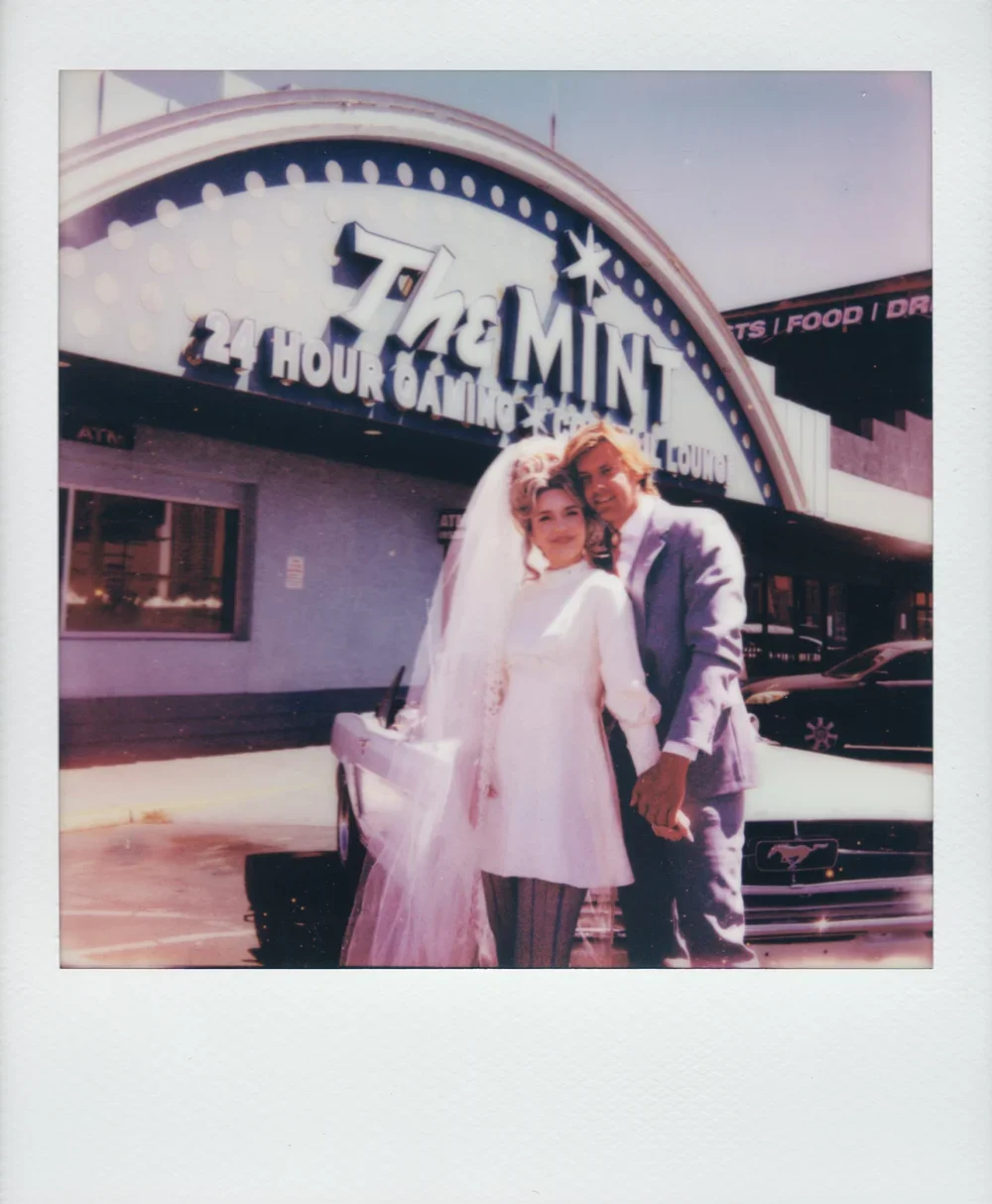 Vintage Styled Vegas Bride and Groom in front of the Mint Bar and Lounge