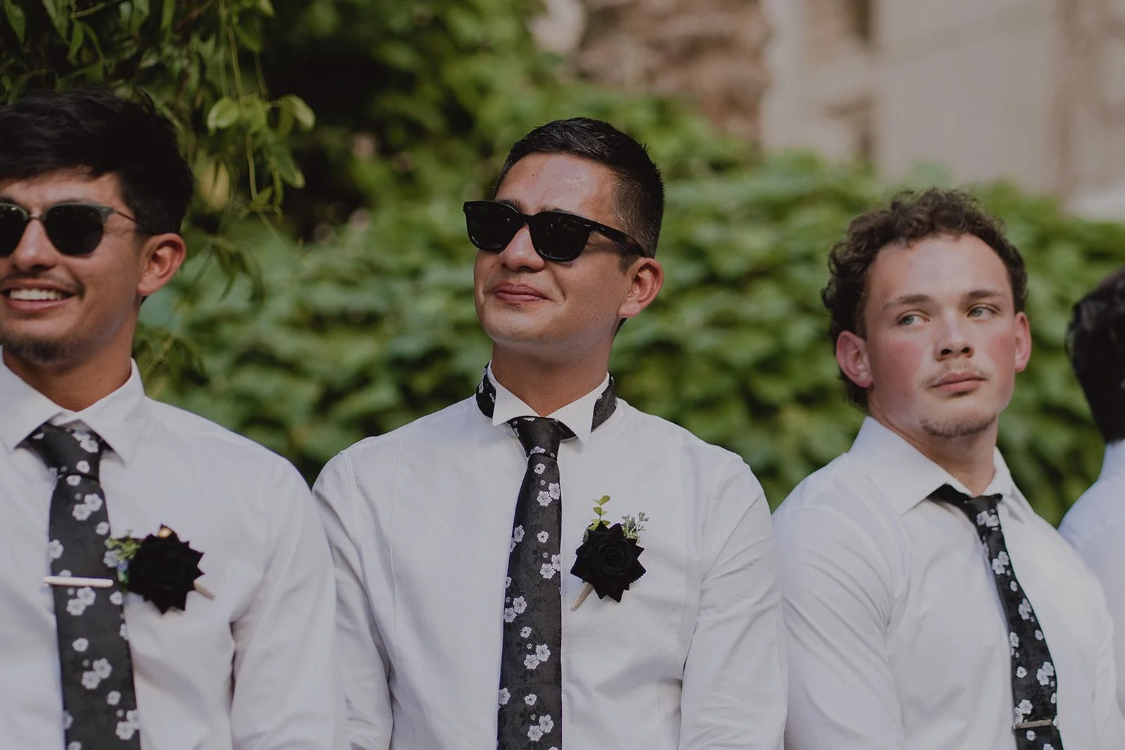 Groomsmen getting emotional during the vows
