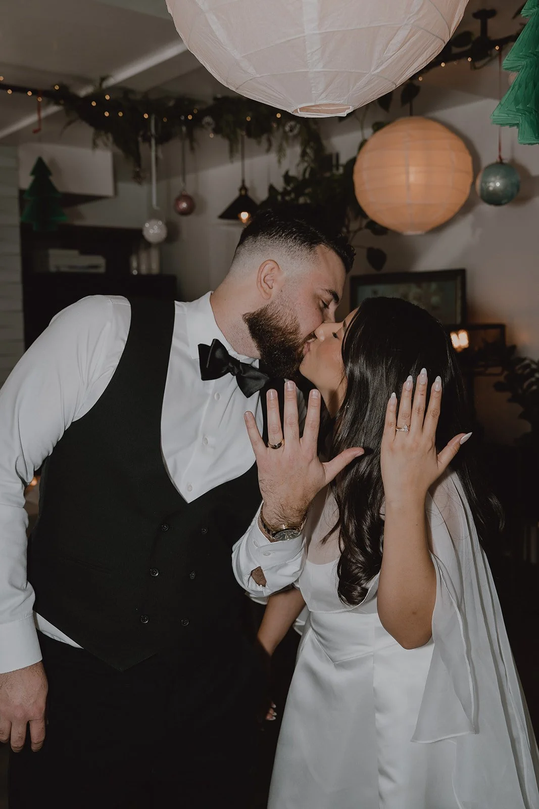 Bride and groom showing off their rings during their Orange County micro wedding brunch.