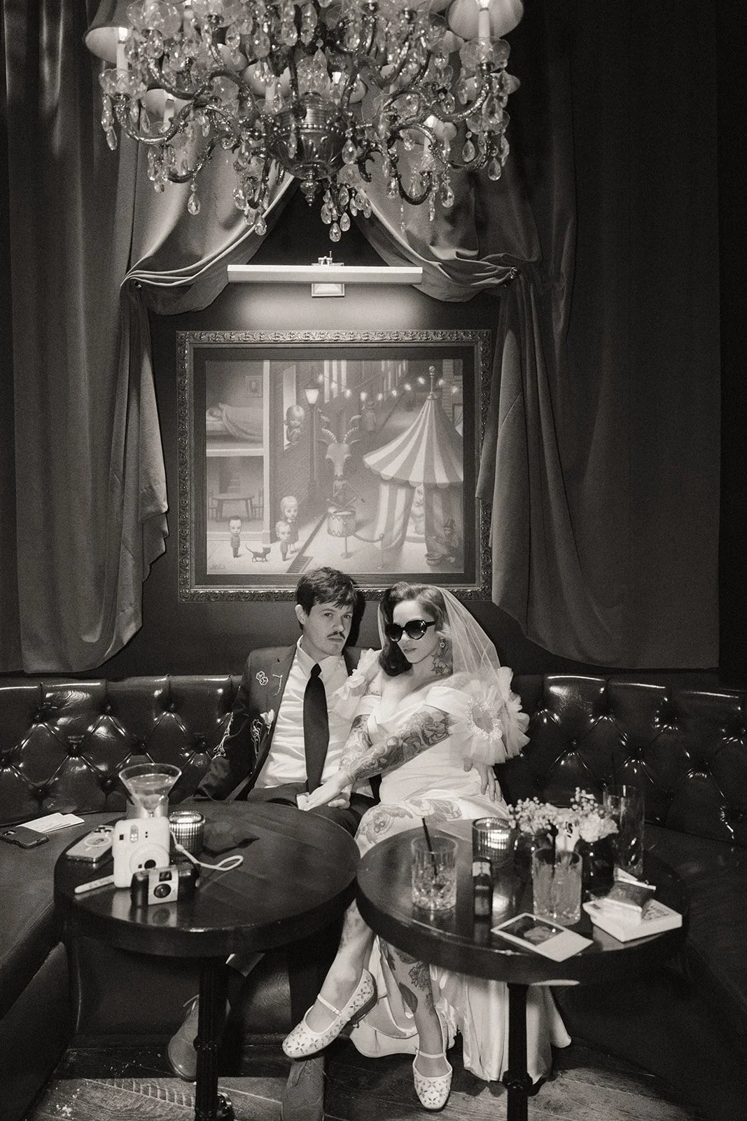 Black and white editorial photo of a bride and groom from their Cheapshots Las Vegas micro wedding reception