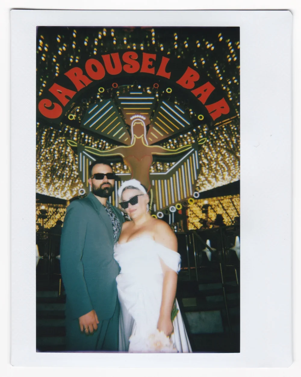 Alternative Bride and Groom in front of the Carousel Bar at the Plaza Las Vegas