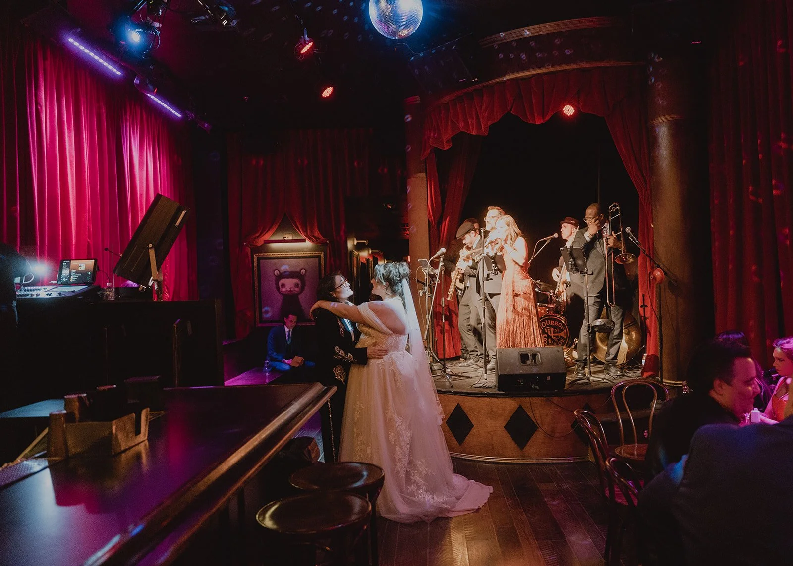 Couple dancing at Cheapshot while Dixie Flats performs on stage.