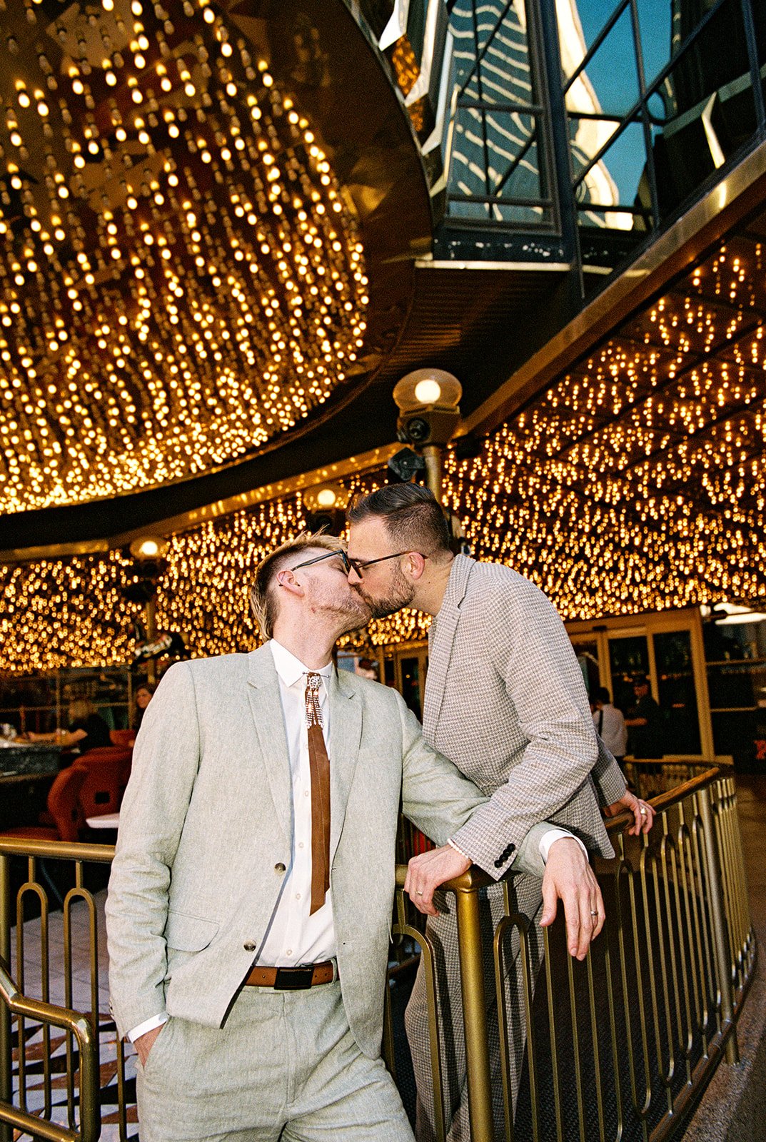 Couple kissing at Carousel Bar in Las Vegas on 35mm film.