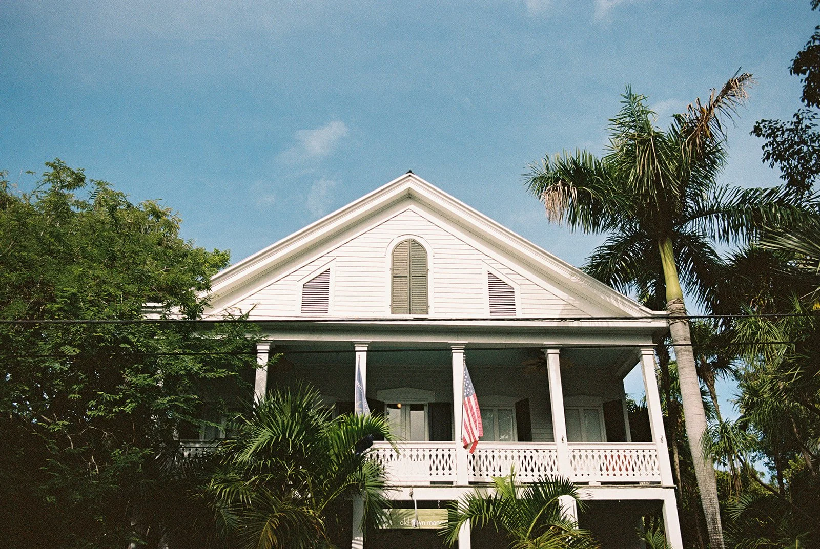 Wide exterior of Old Town Manor in Key West, Florida.