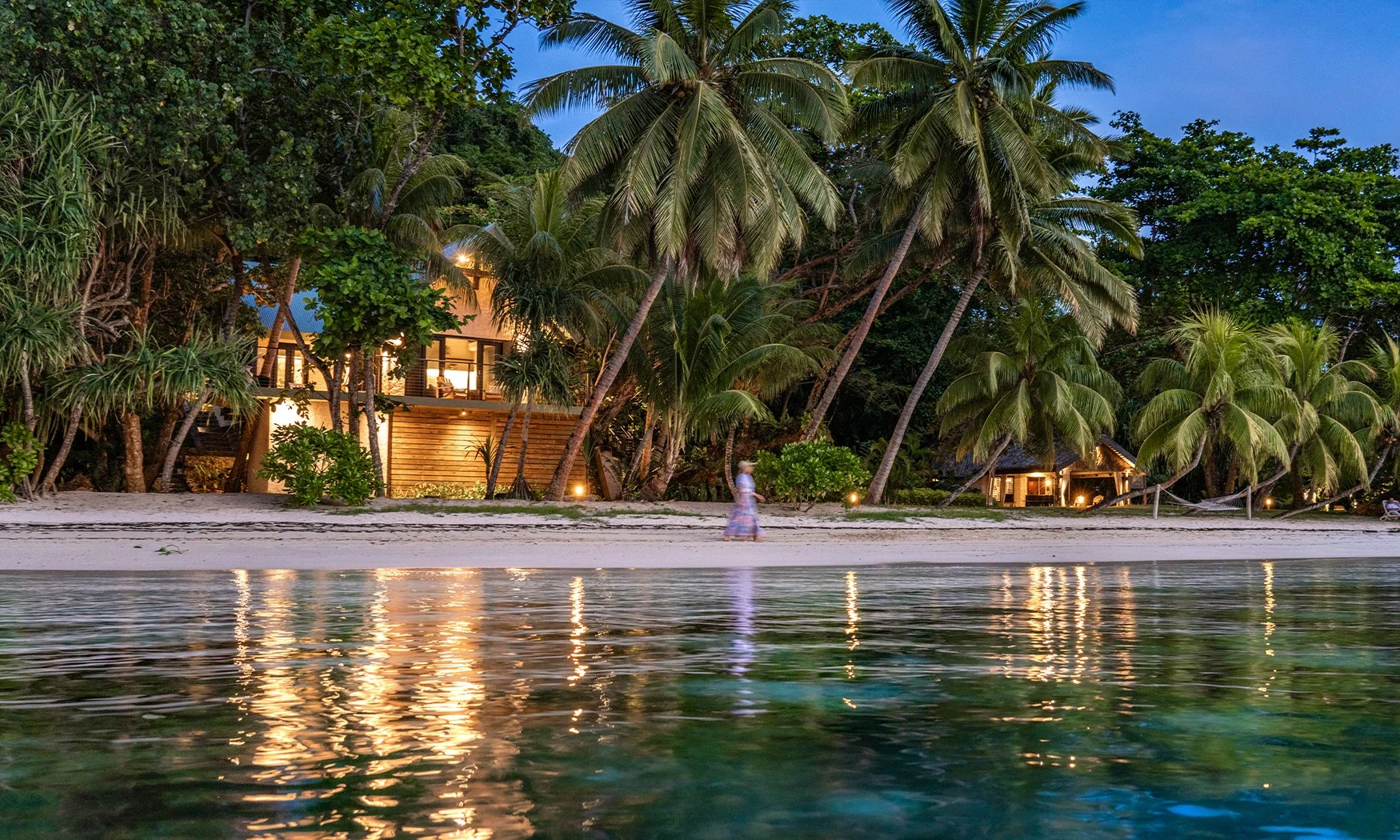 matangi-island-resort-luxury-treehouse-villa-plunge-pool-evening-building-lights.jpg