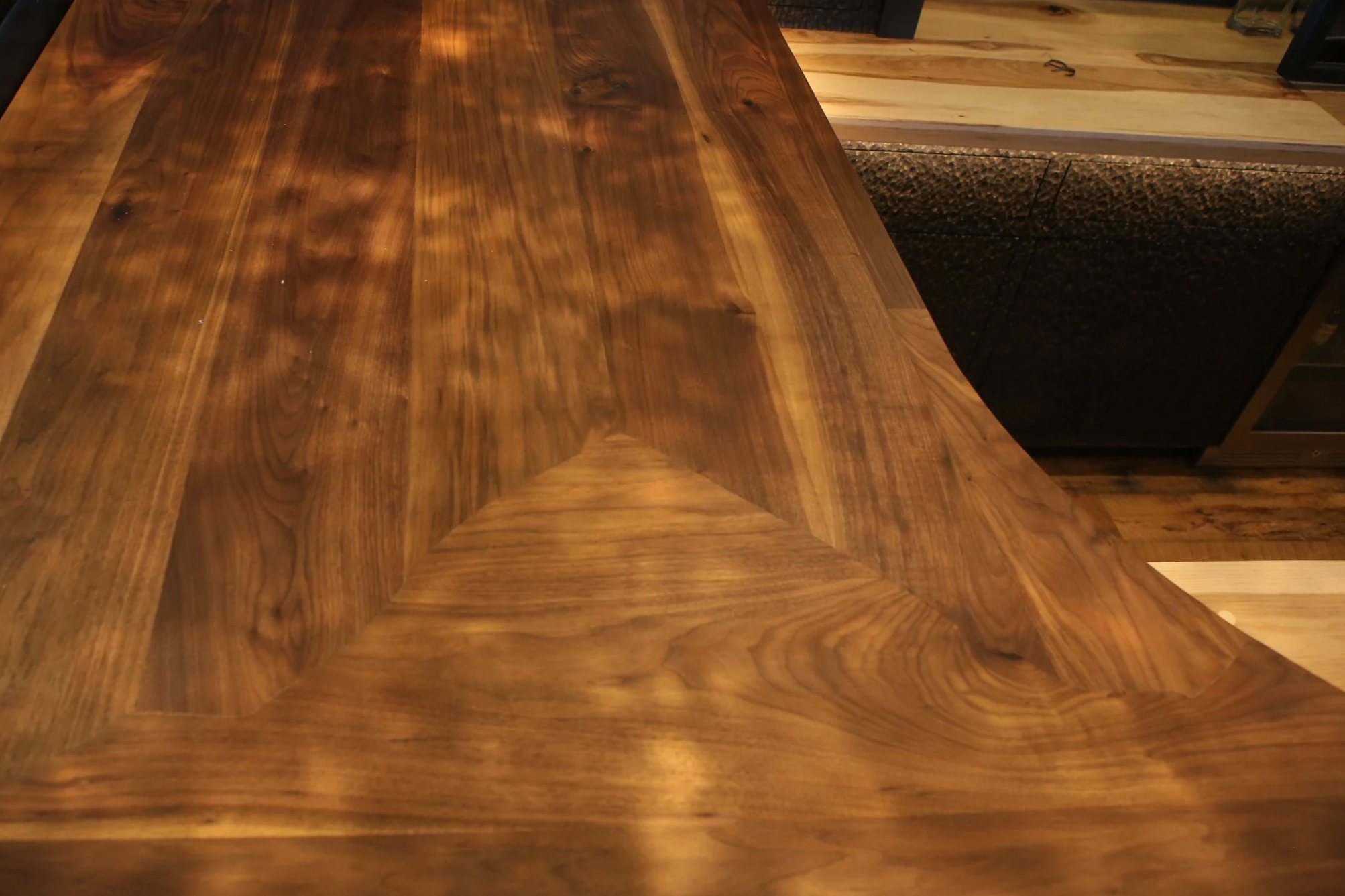 Seamless joinery  on 10/4 Walnut representing Wilson Peak filling this project with fun easter eggs.