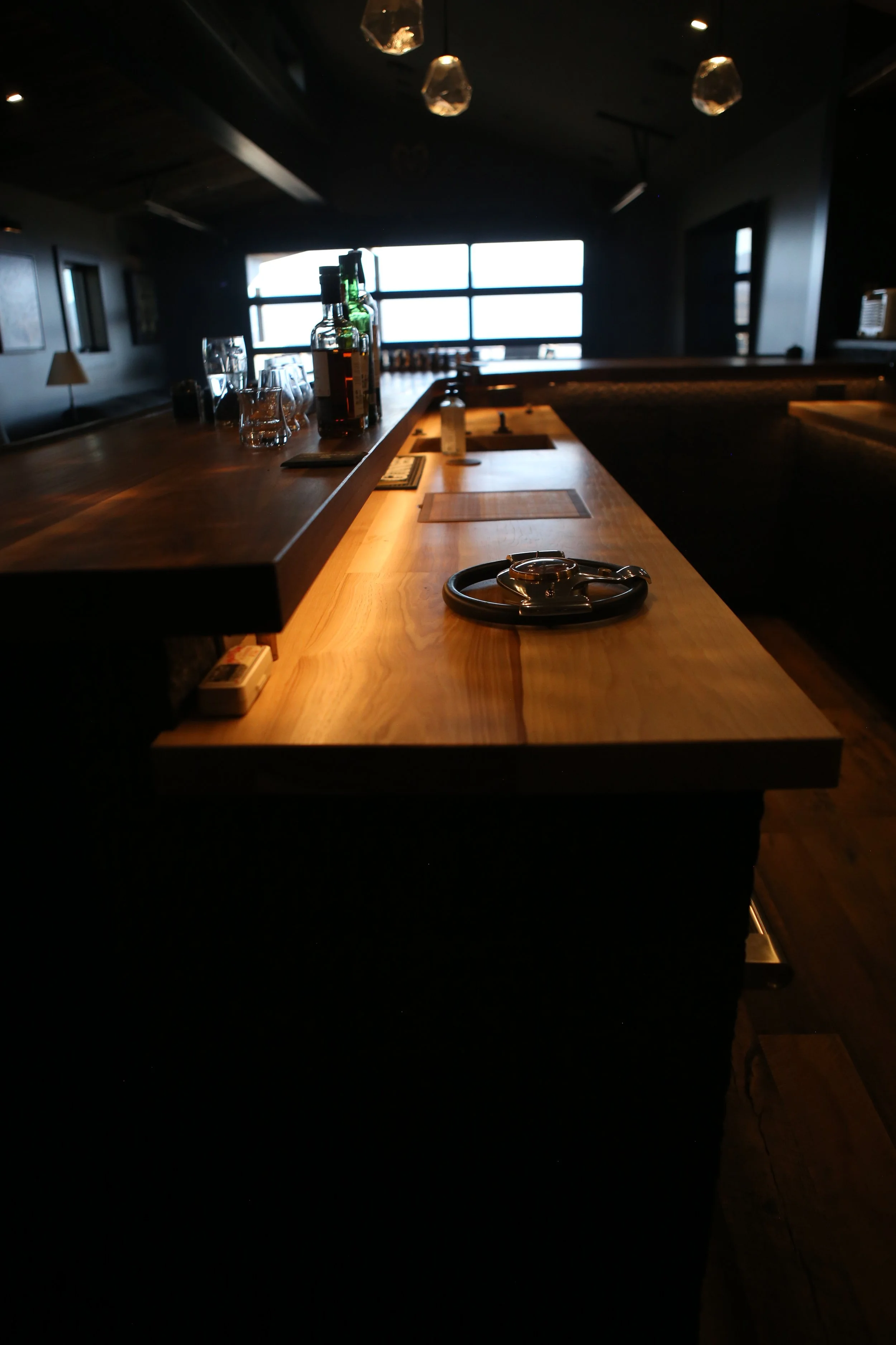 Light designed to keep the mood right while reflecting off the solid hickory counter tops.  
