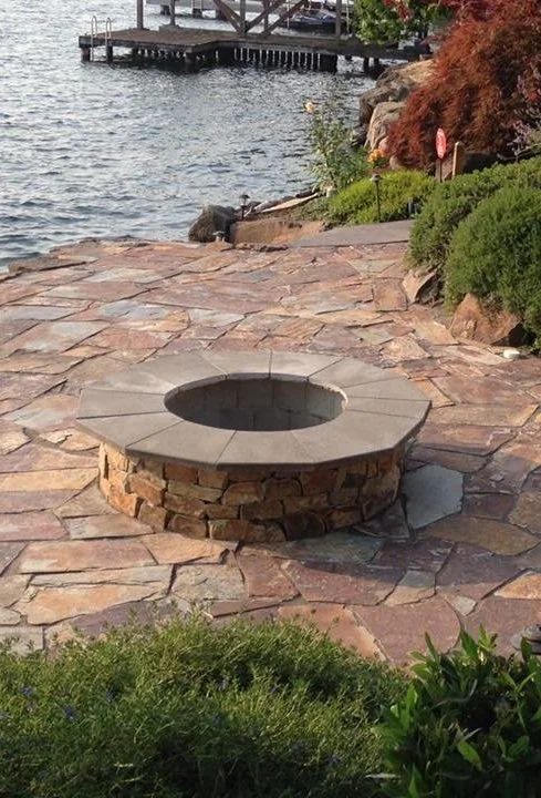Issaquah stone patio hardscaping with outdoor fire feature 