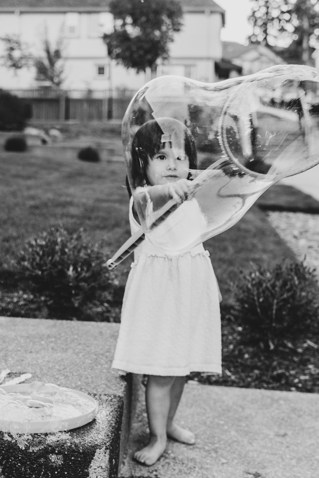 black-white-child-summer-bubbles-lifestyle-portrait-portland-oregon.jpg
