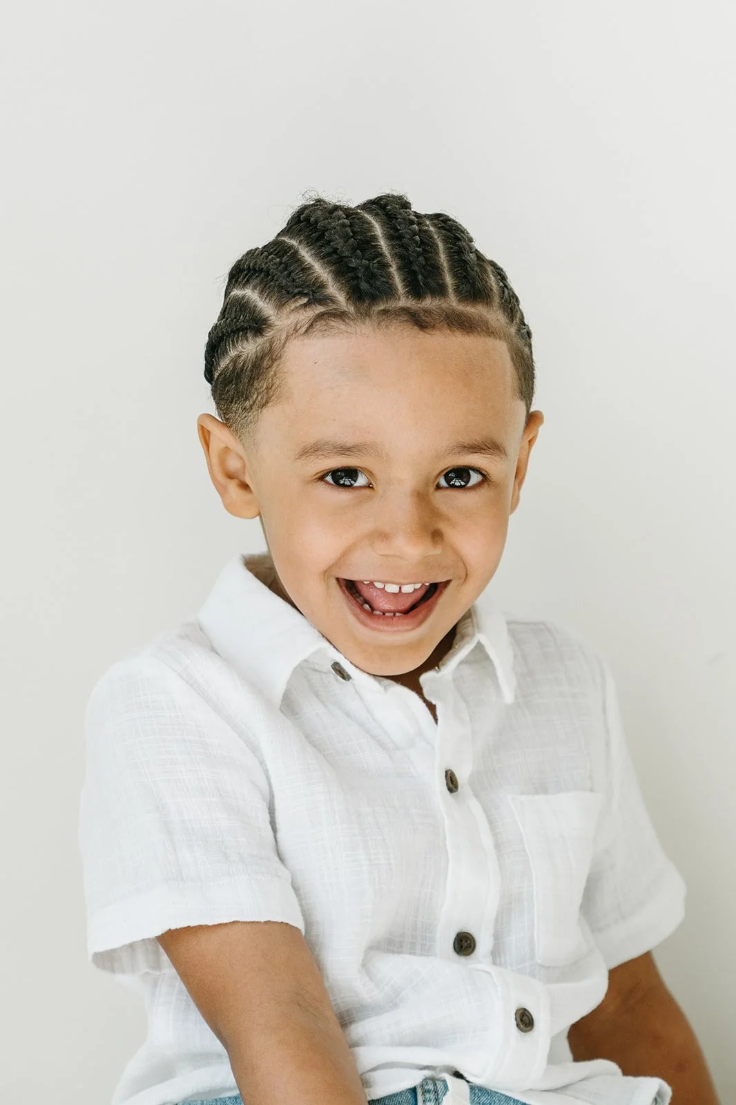 candid-preschool-child-portrait-studio-white-backdrop-portland-oregon.jpg