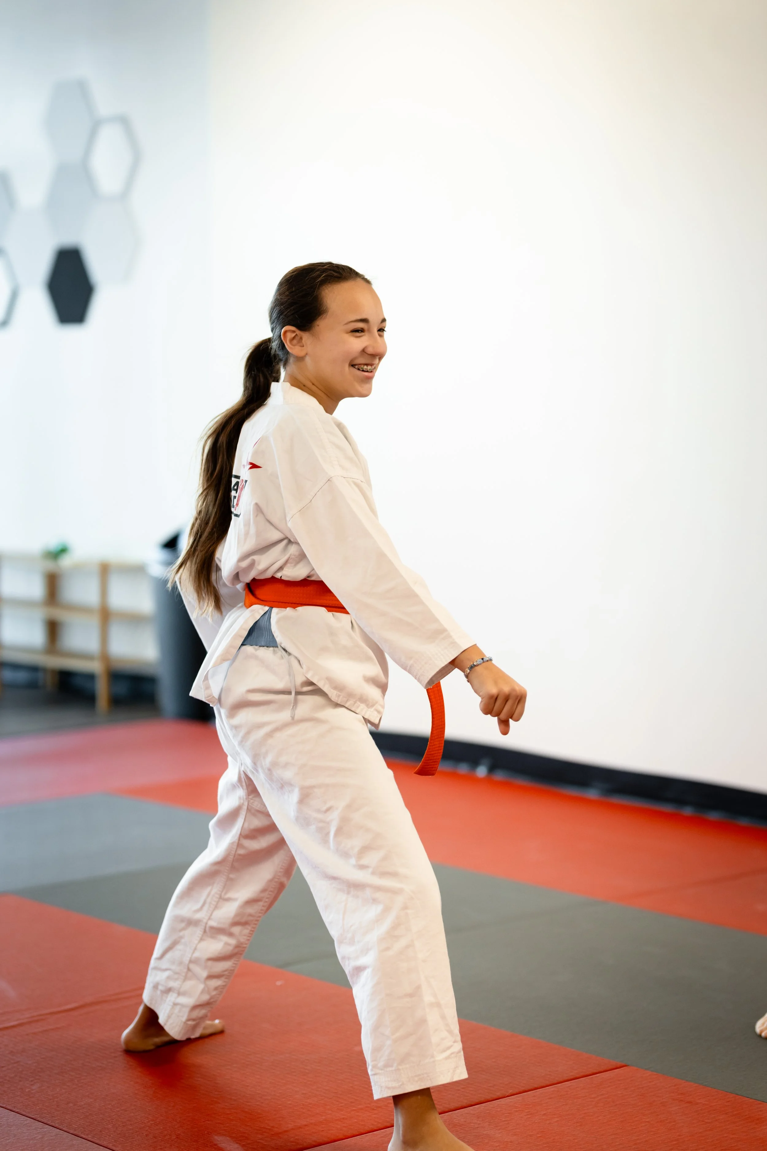 Vertical Taekwondo Lees Summit, Teenage does a Karate Low Block
