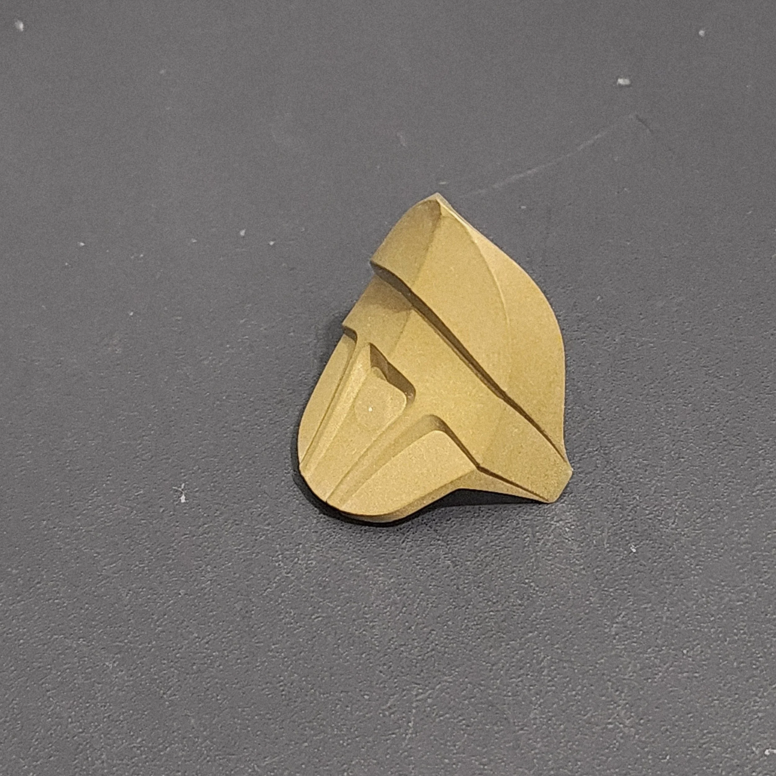 Brass filled curved mask