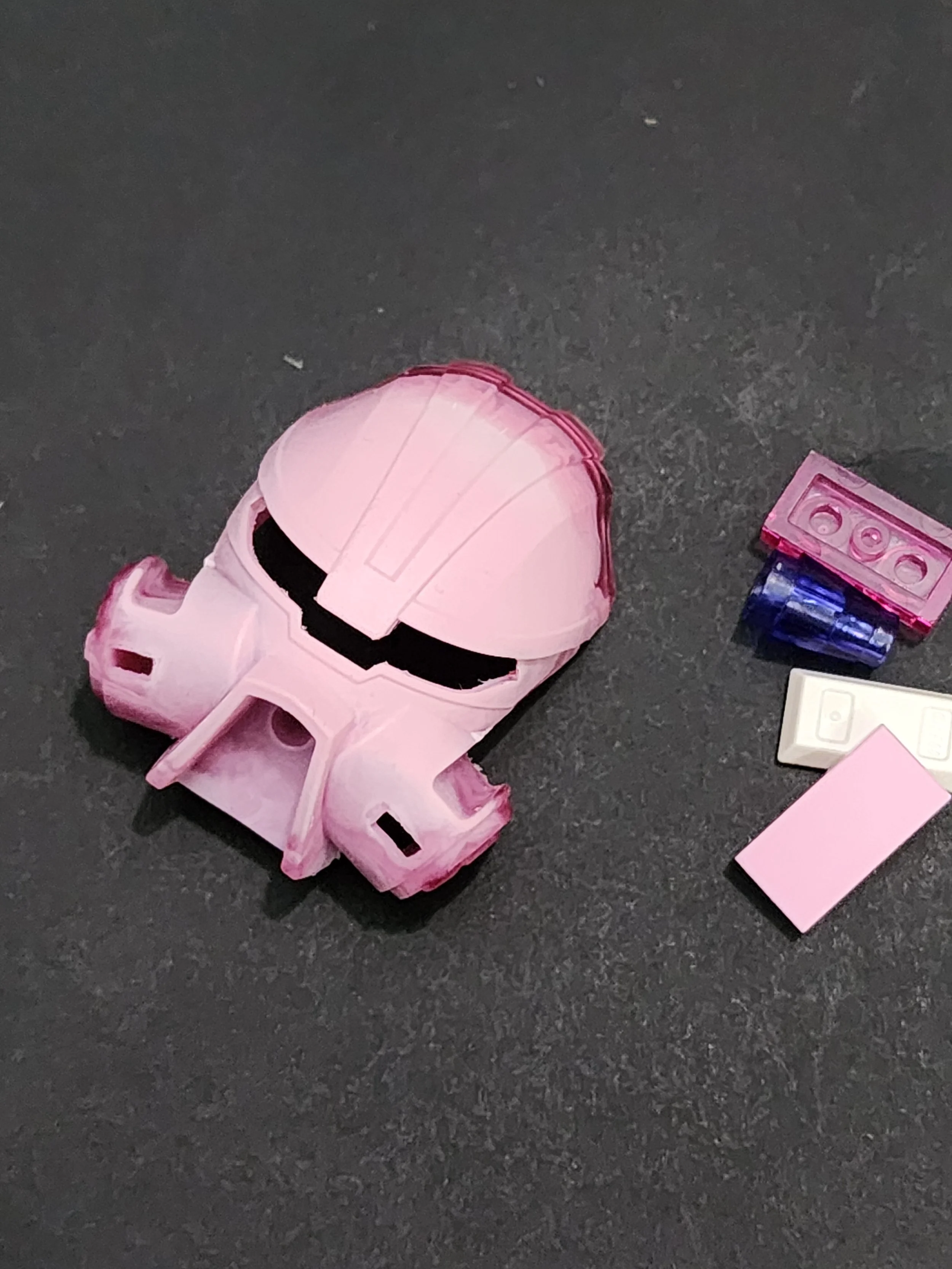 white pink and translucent dume mask