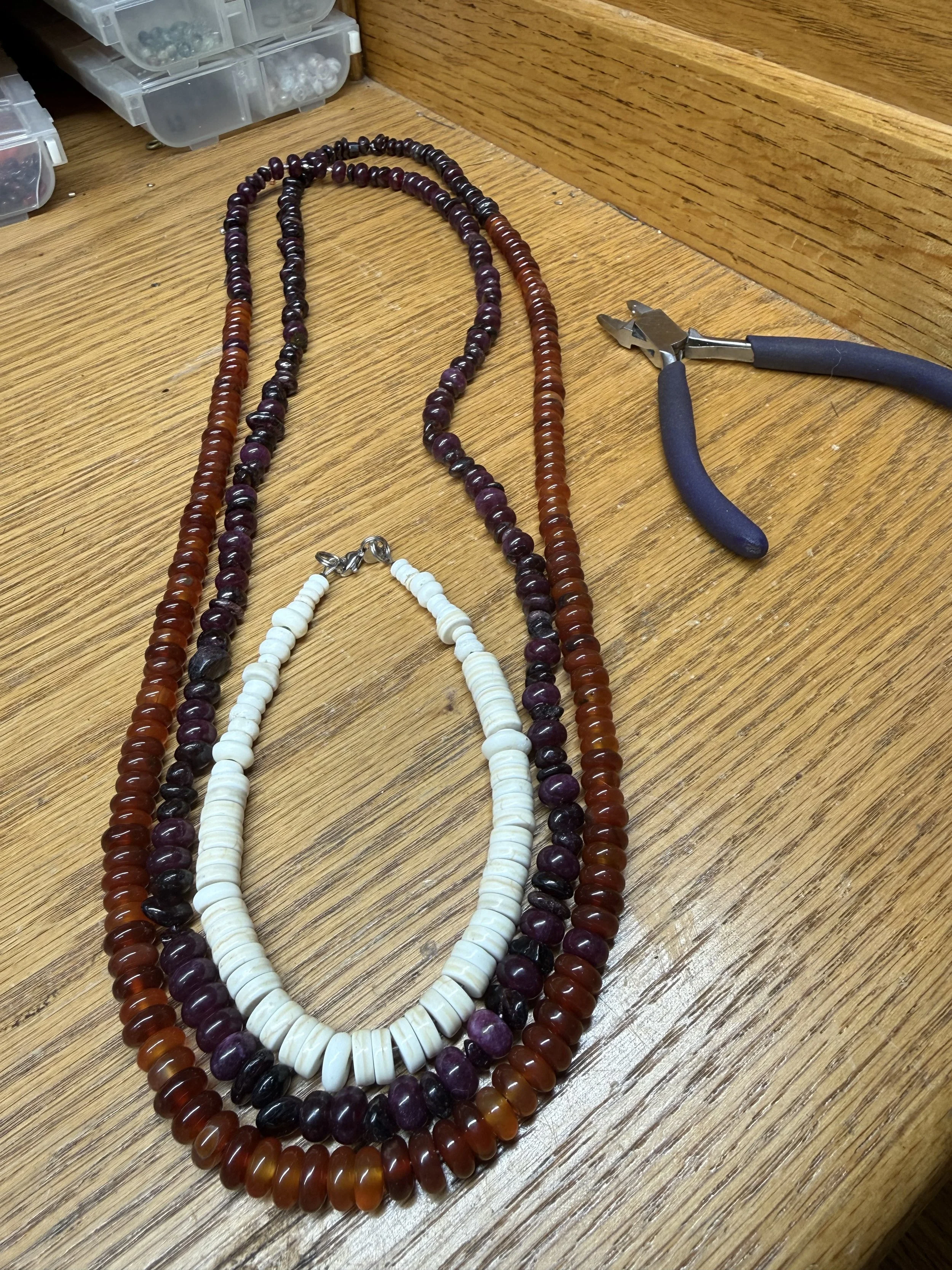 Group A Culture (South of Egypt) 3700-2800 BCE. in the British Museum. Garnet and Carnelian Single Long Strand. Eggshell Beads  interpreted using a mix of natural beads bones and shell. 