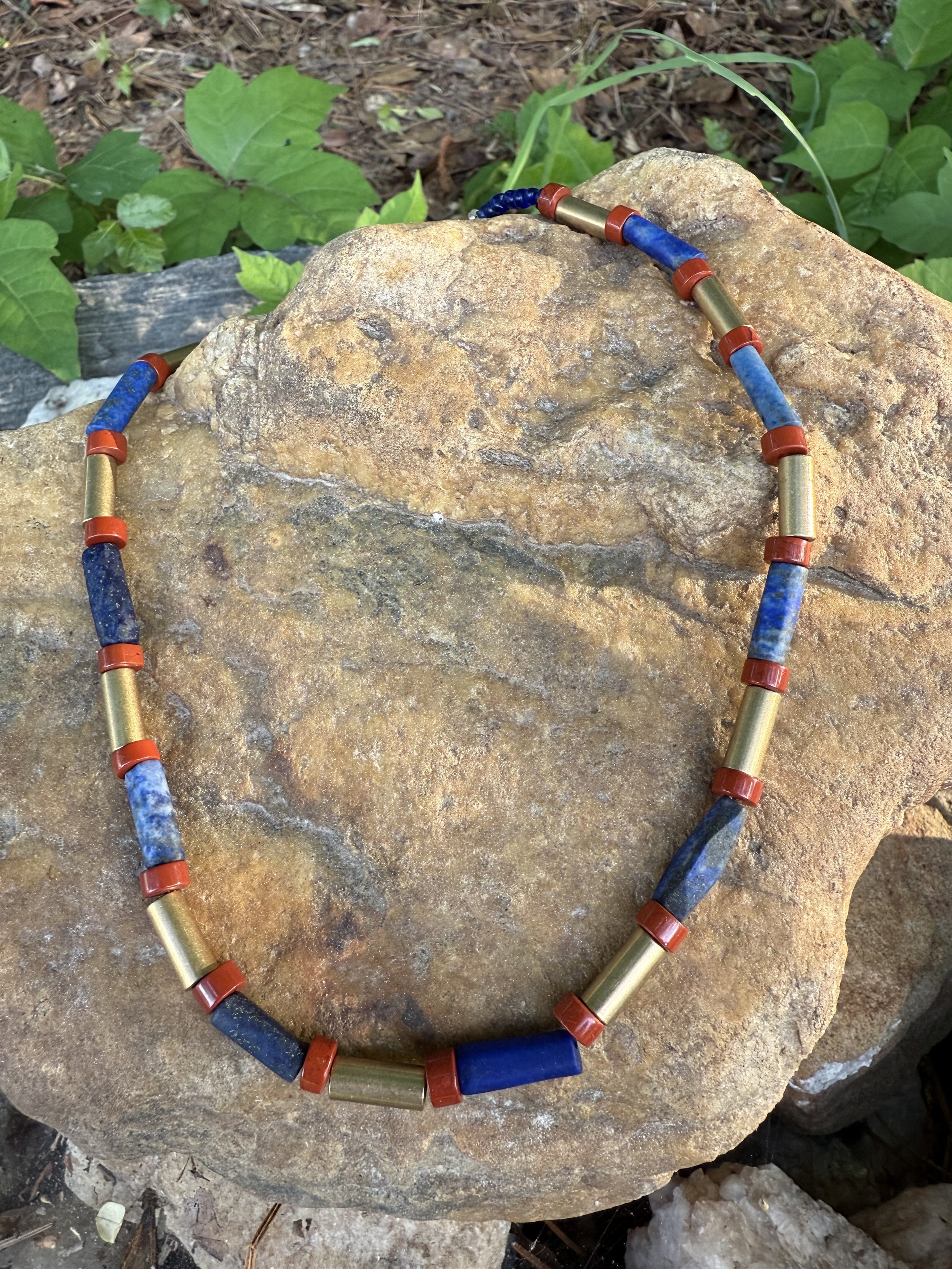 Old Babylonian period, 2000-1600BC From Ur. Original is Lapis Gold and Carnelian. Mine is Lapis, Brass, and Jasper.