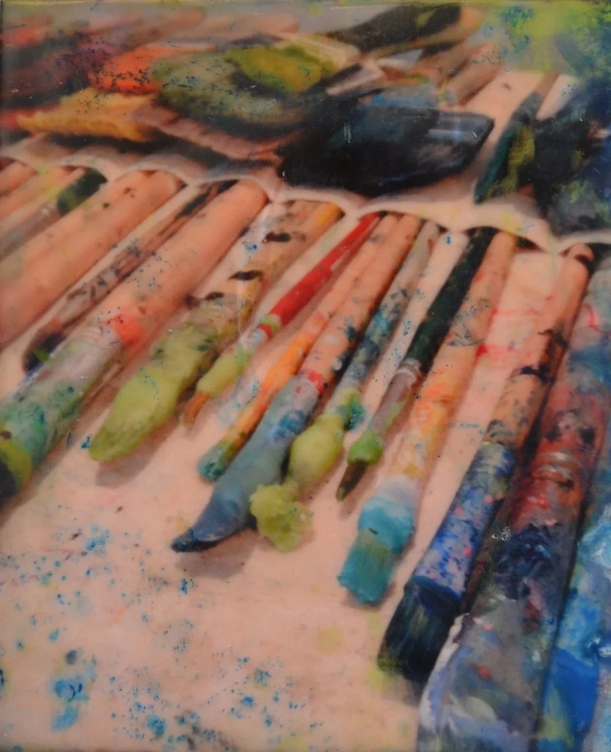 Colourful encaustic paint brushes in Dee Hutton's studio.