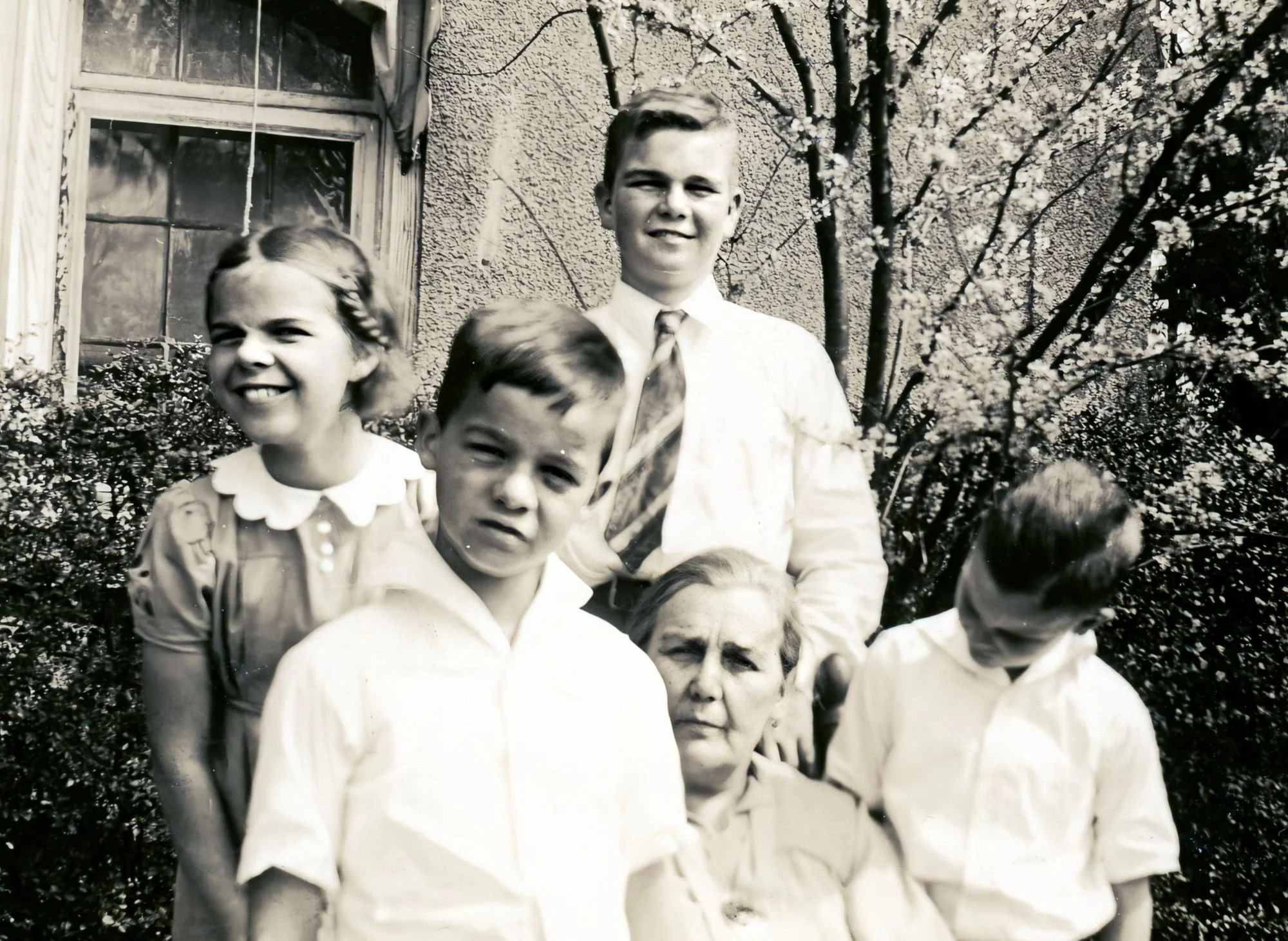 Tom and his siblings, 1936