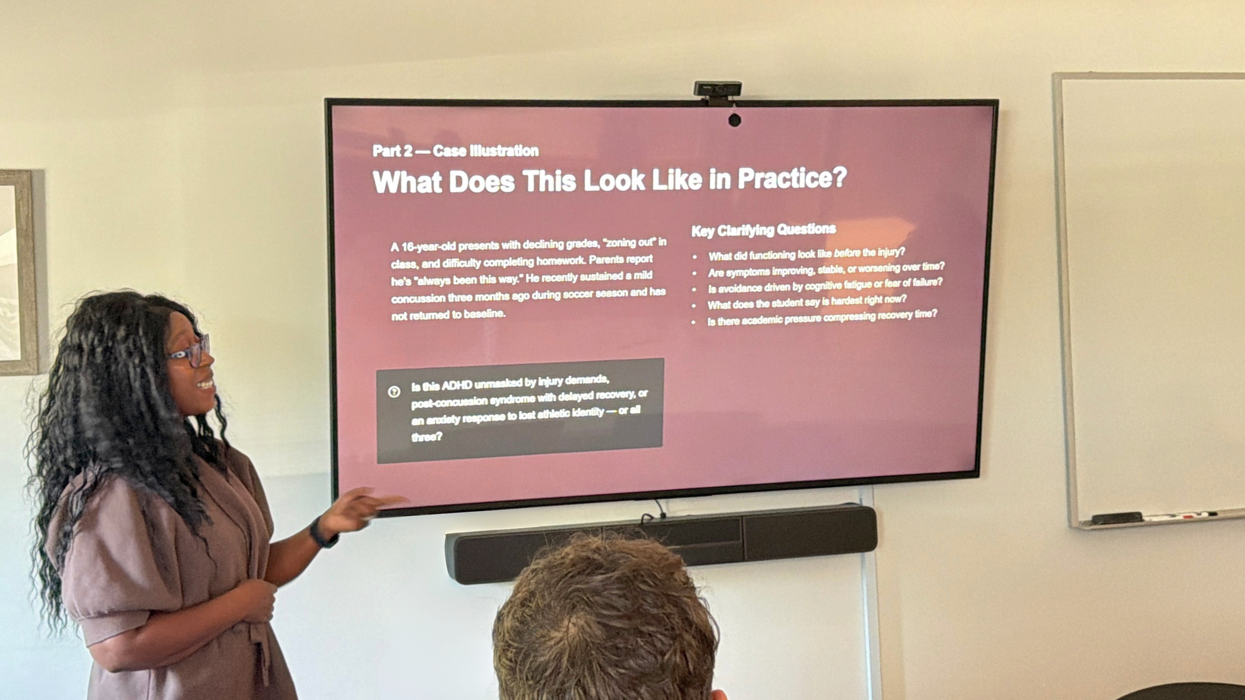 Dr. Nicole Murray answering questions during a professional education session at Trent University.