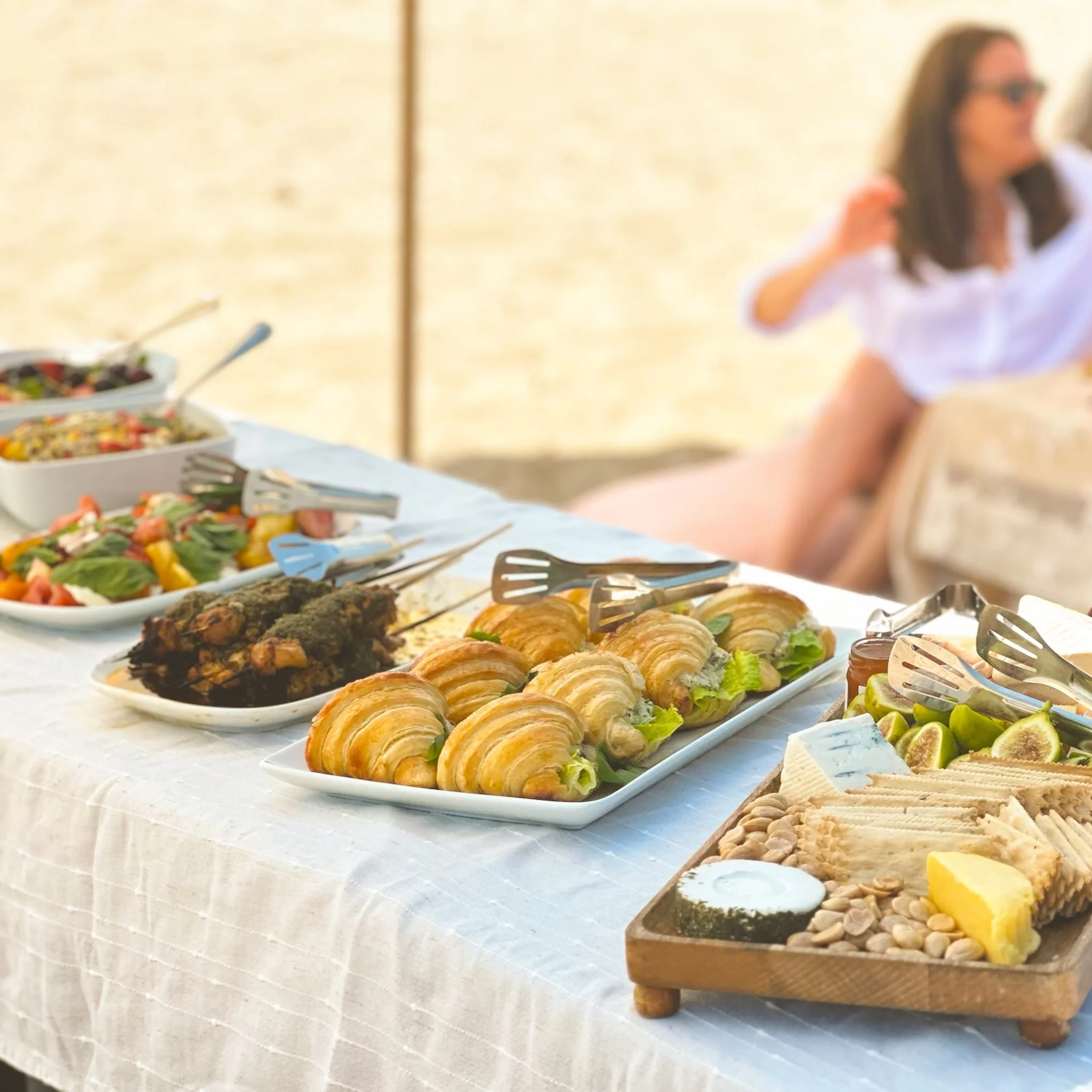 A Santa Barbara 21st birthday celebration filled with custom macarons, crab salad croissant sandwiches, chicken skewers, vibrant salads, and lemon curd tarts for desserts &mdash; all enjoyed with the ocean as the backdrop. 🌊✨ @revepattiserie @sbpicn