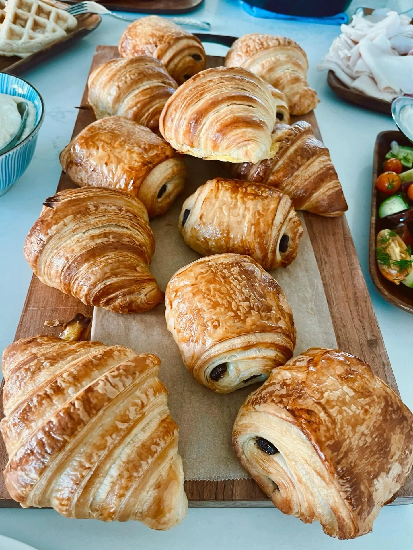 The perfect Father&rsquo;s Day morning 💙  A beautiful brunch spread from Chef Jacob with a warm skillet frittata and fresh flakey croissants and pain au chocolats from @revepatisserie &mdash; truly a little taste of France. ⭐️🍾 #montecito #privatec