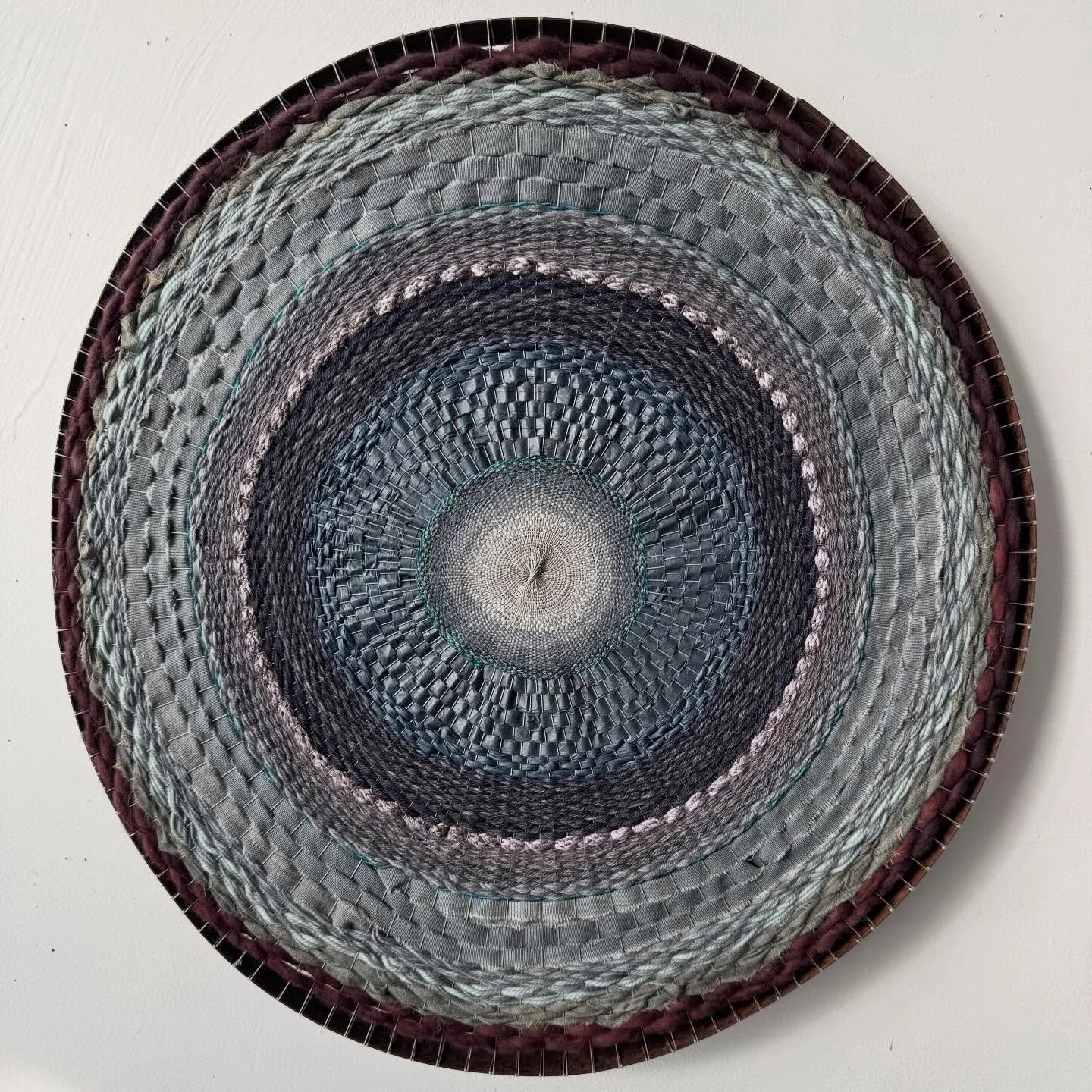 &lsquo;Ocean Lake, Garnet Sand&rsquo; 

Taking inspiration from my surroundings this week to create this circular woven piece. The colour palette is taken directly from Lake Ontario and the beach @gibraltarpointto &mdash;as you can see in the last ph