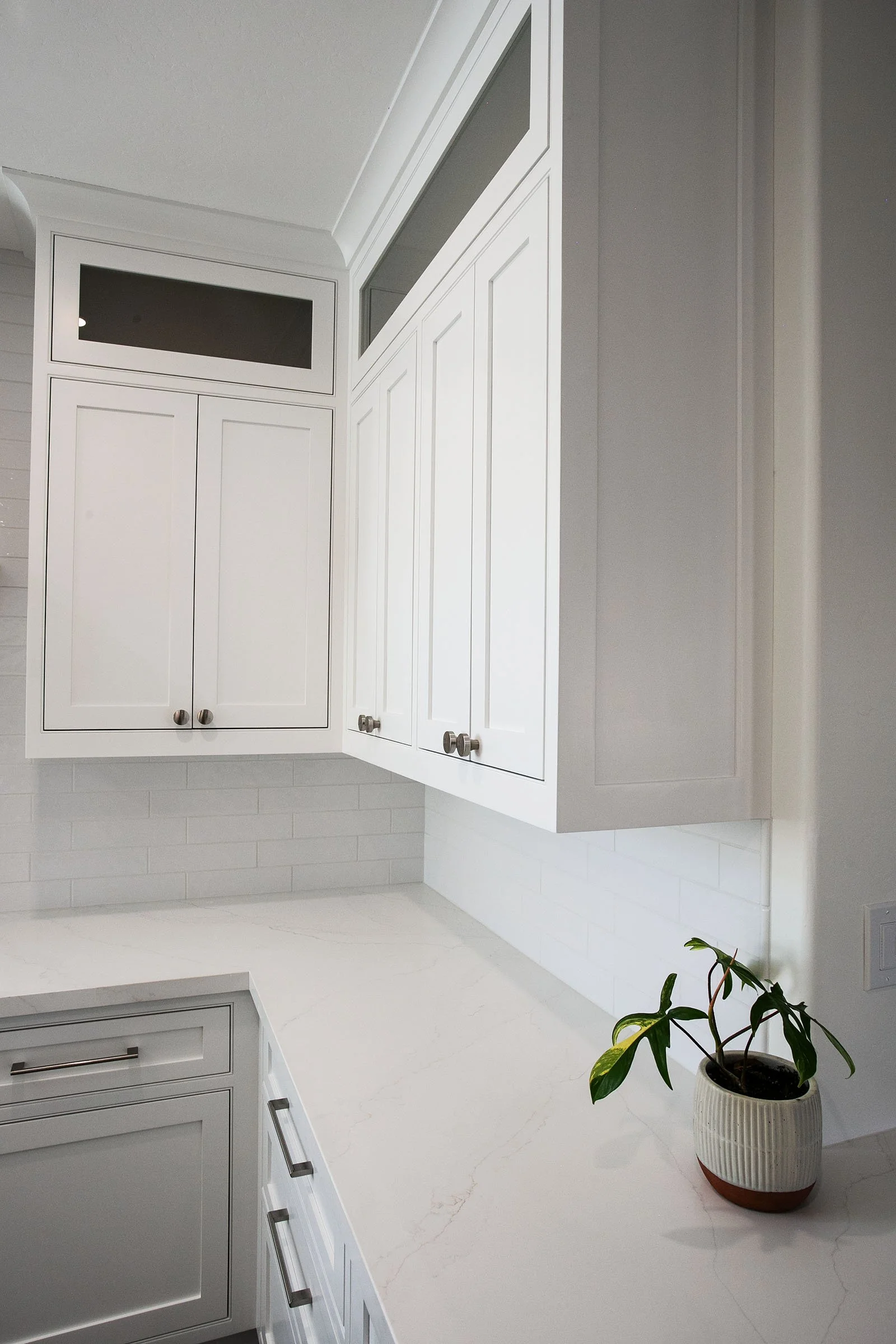 White shaker cabinet detail with quartz countertops and custom cabinetry in Tehachapi, California