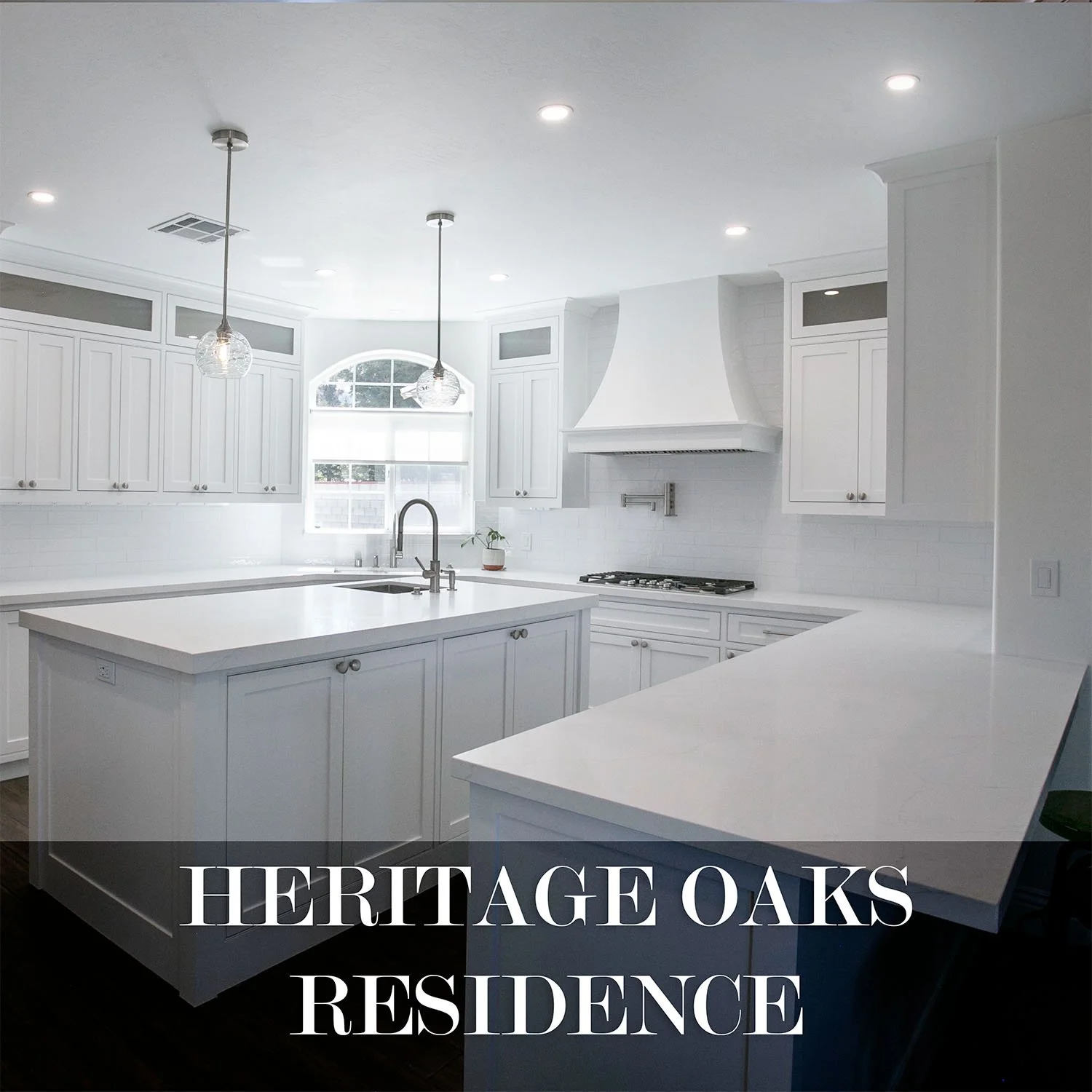 All white kitchen with shaker cabinets and white countertops
