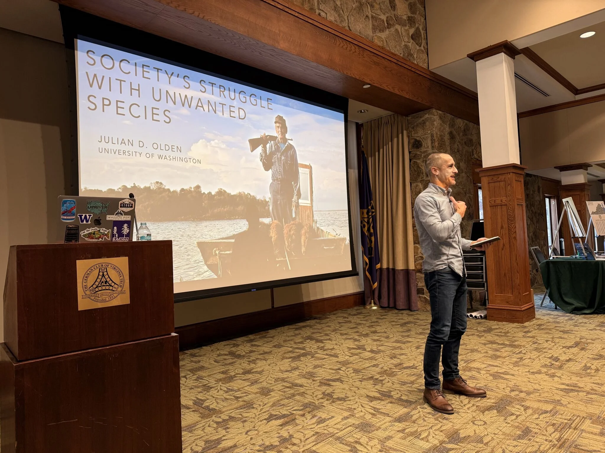 Julian delivering a keynote at Invader Symposium