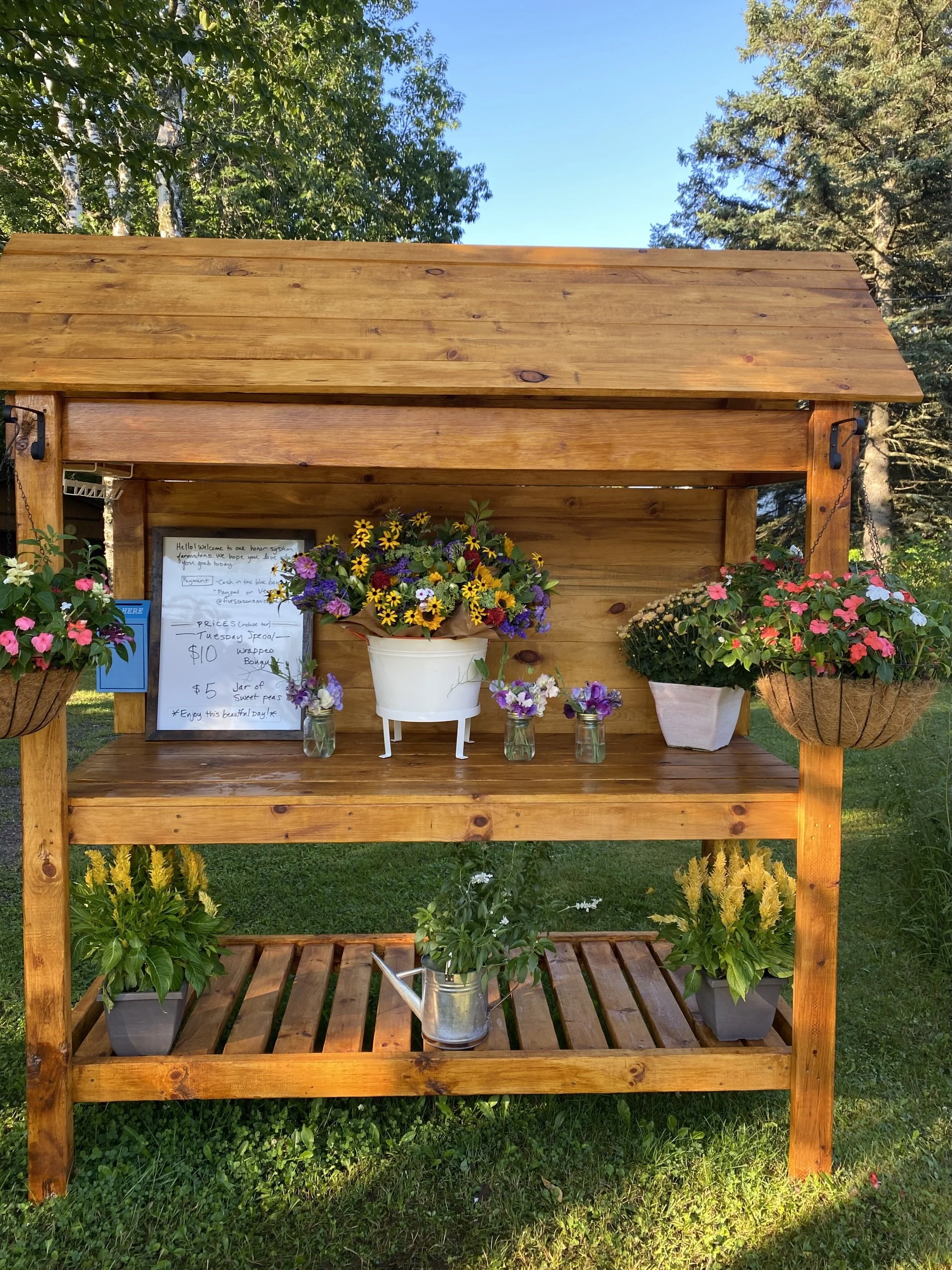 Farmstand with flowers for sale