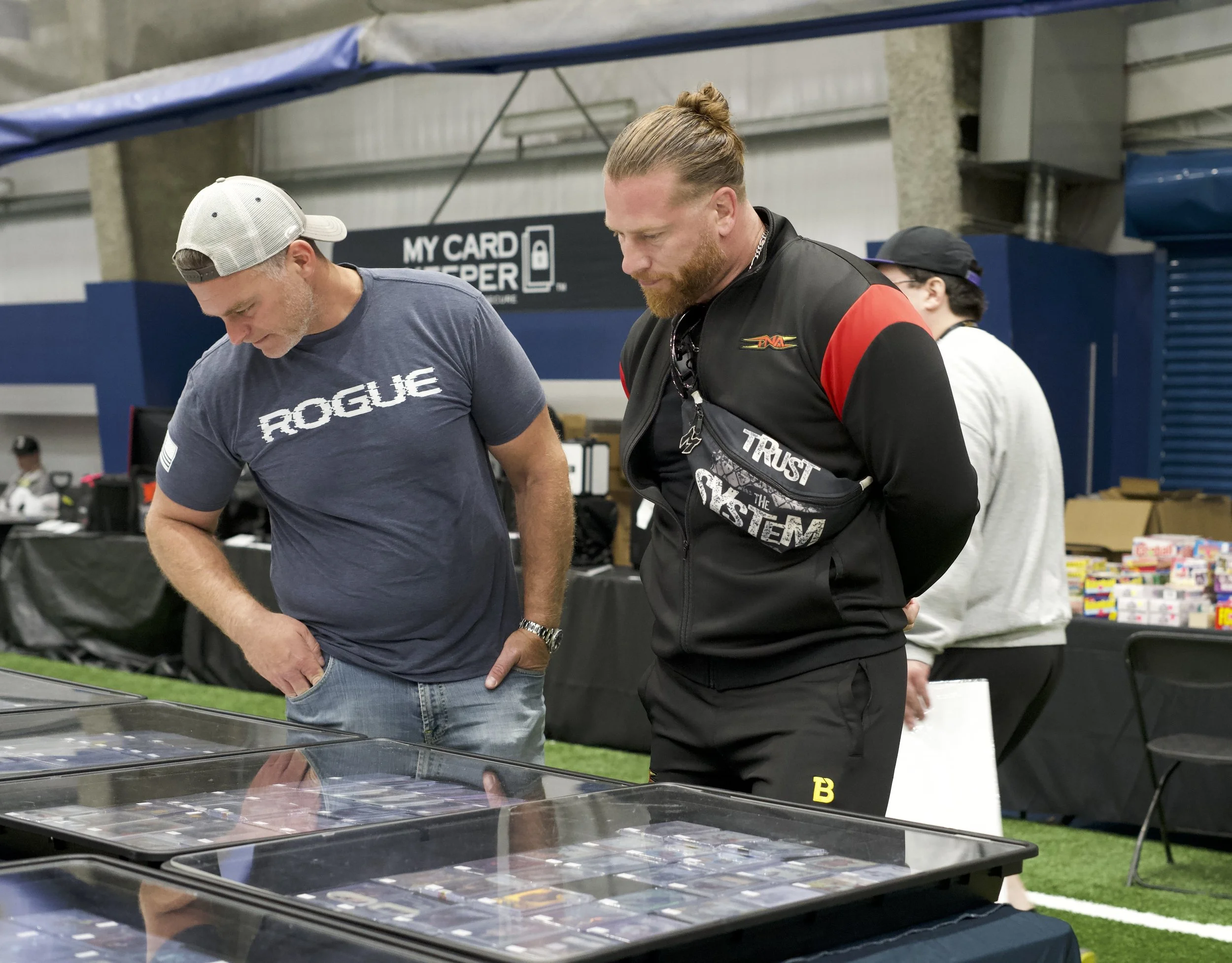 Wrestler (and collector) Brian Myers scoping out the vendor tables.jpeg