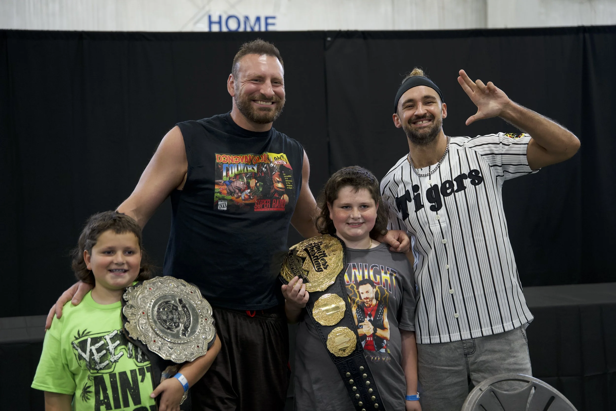 Wrestlers Dijak and Anthony Green with fans