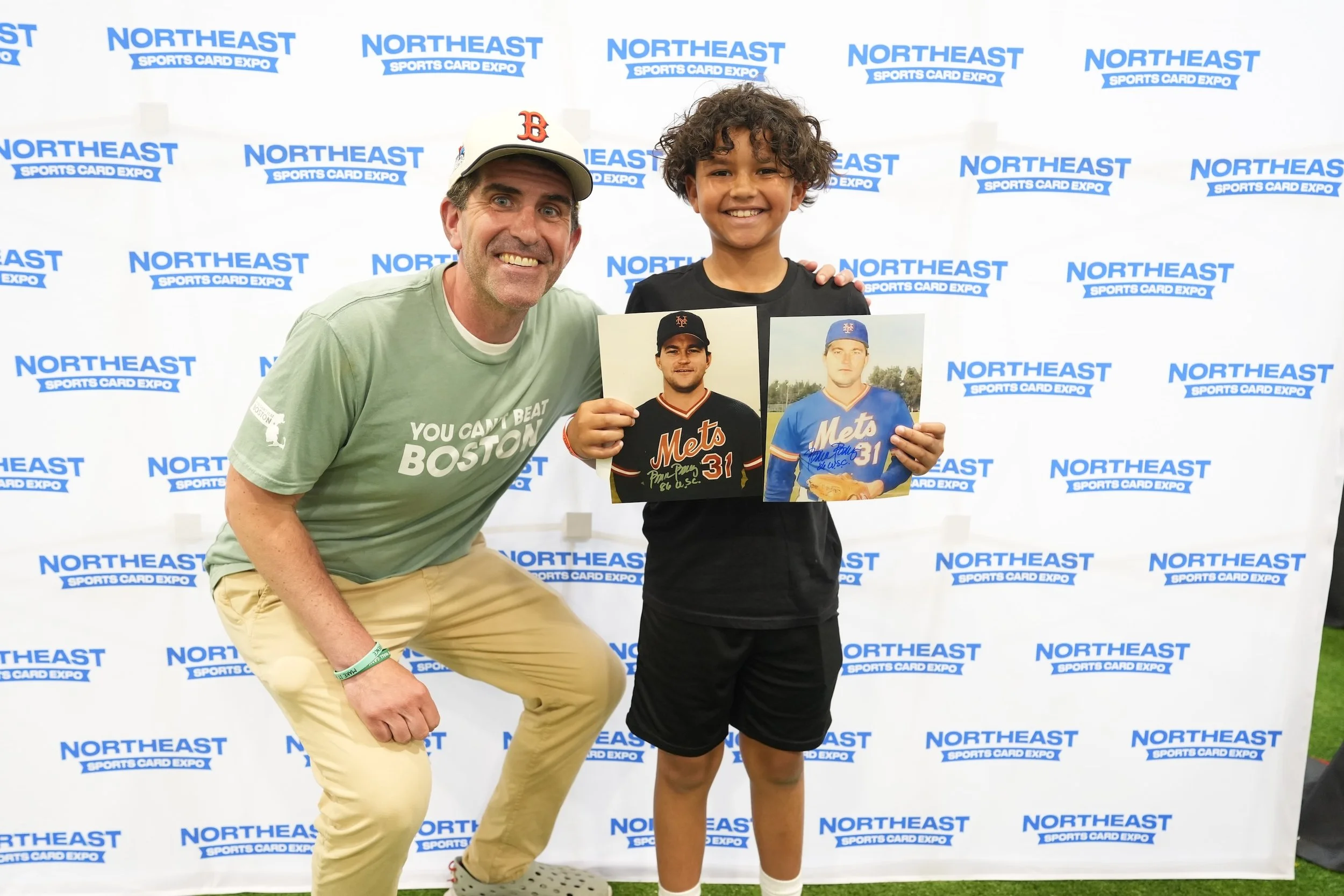 Nick "Fitzy" Stevens with a young attendee showing off his newly minted autographs