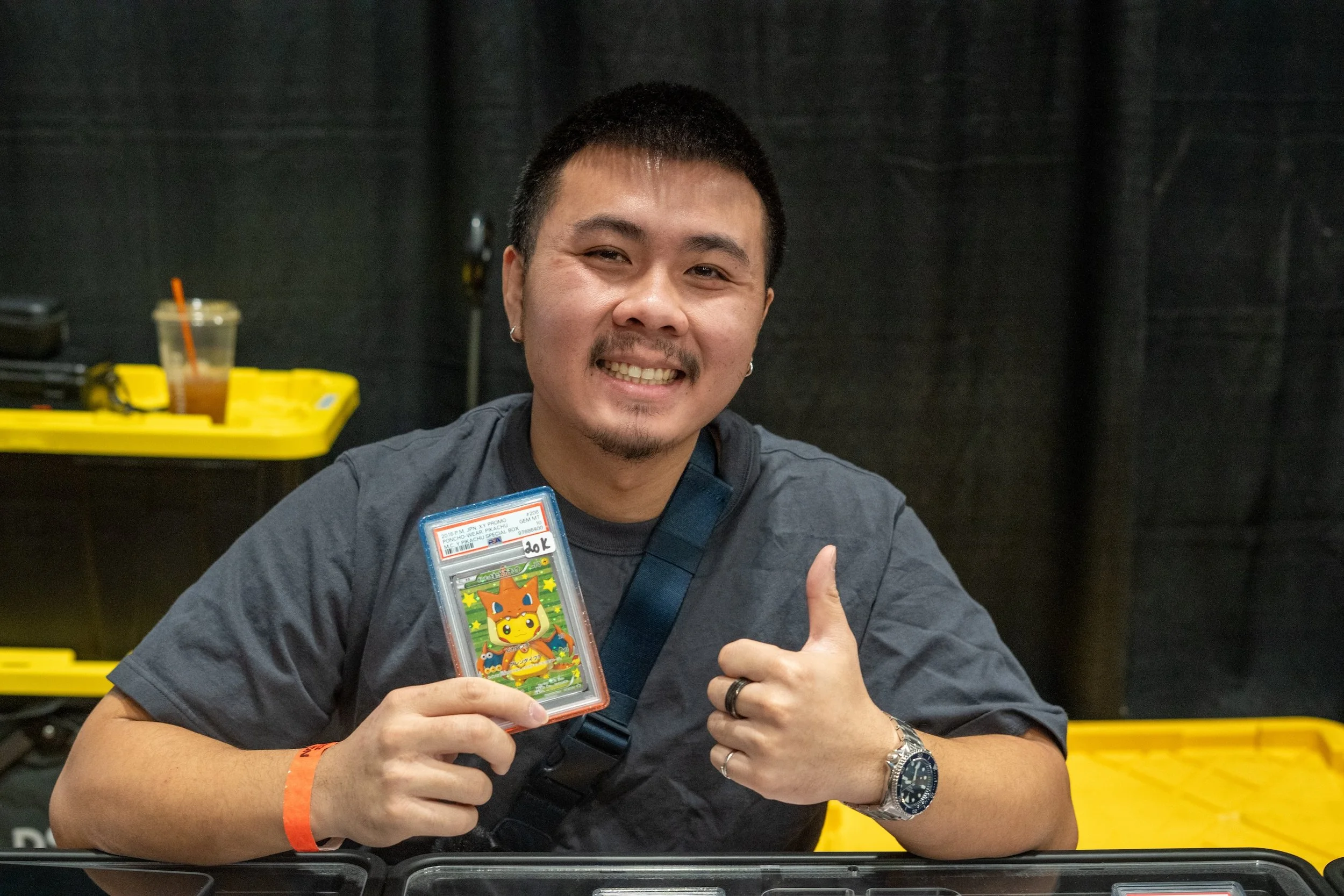 A Pokemon vendor with his card