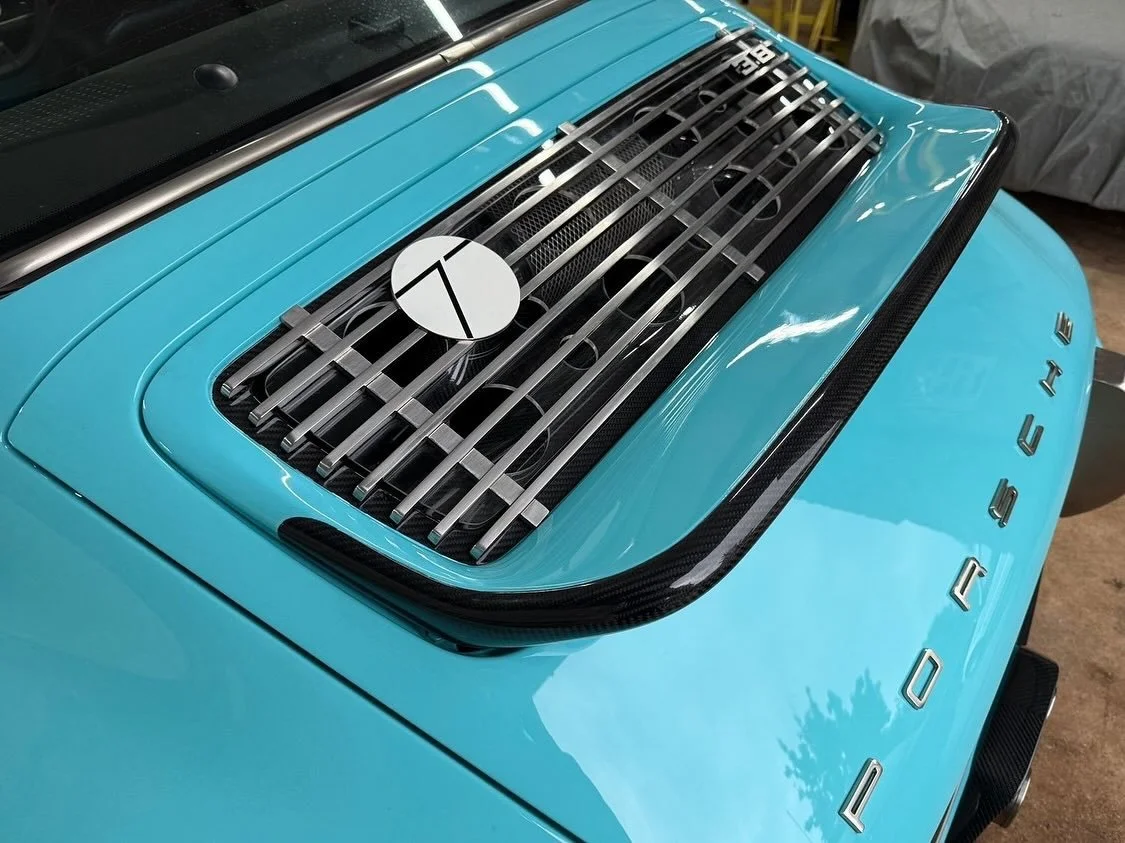 964 Spoiler and Grill

This 964 spoiler and grille is a replacement for the standard item.

Available in GRP or carbon fibre.  Grill is available in polished or anodised black