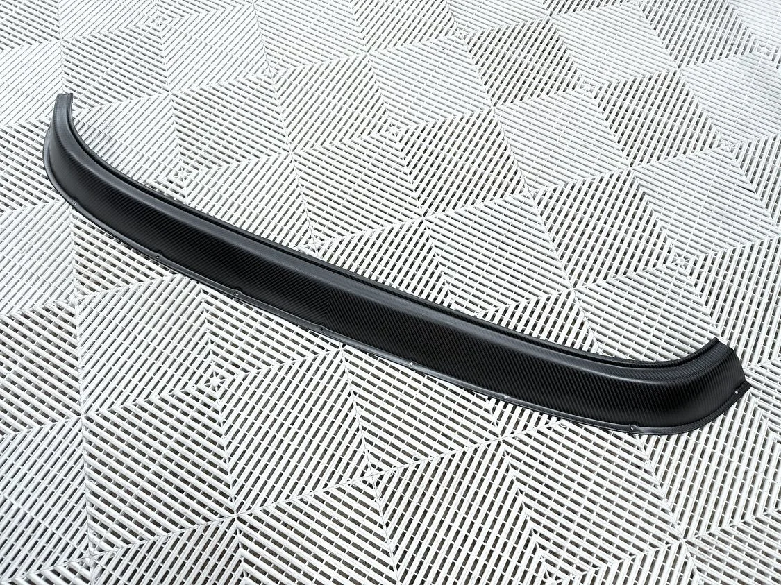 Carbon Fiber G-body rear bumper valance with no exhaust cut outs

Made from 100% pre preg carbon fiber.