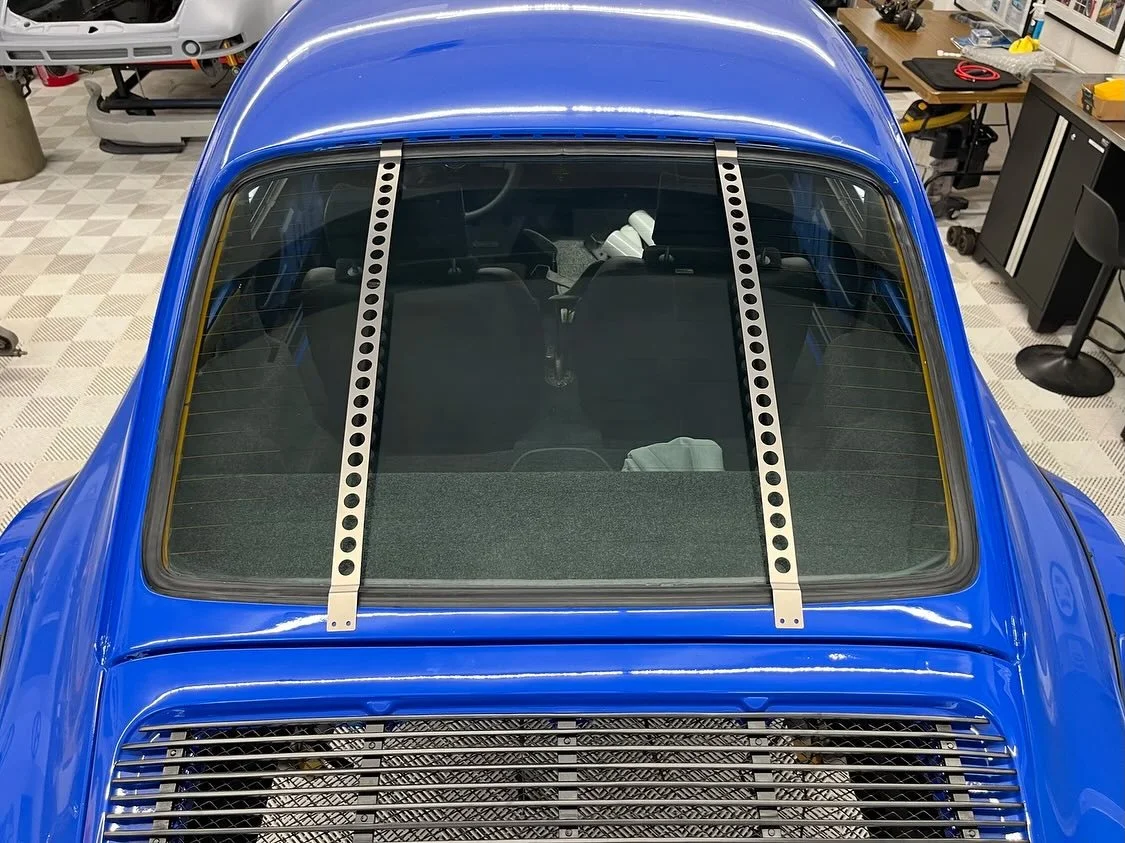 911 Rear Window Brace

A pair of window braces designed to stop a plexiglass rear window from blowing out on race cars. These can also be fitted over glass window for the racing look.

They come with 2 rubber bungs to stop them rattling on the window