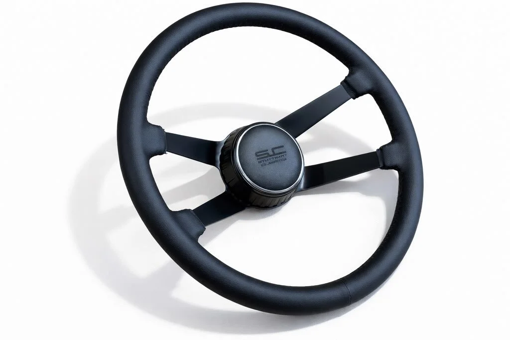 Machined from billet aluminium with laser-engraved leather, chrome steel retaining ring, and a complete internal fitting kit. This is a direct replacement for the standard part and installs with ease. 

Email us your own logo or crest &mdash; we can 