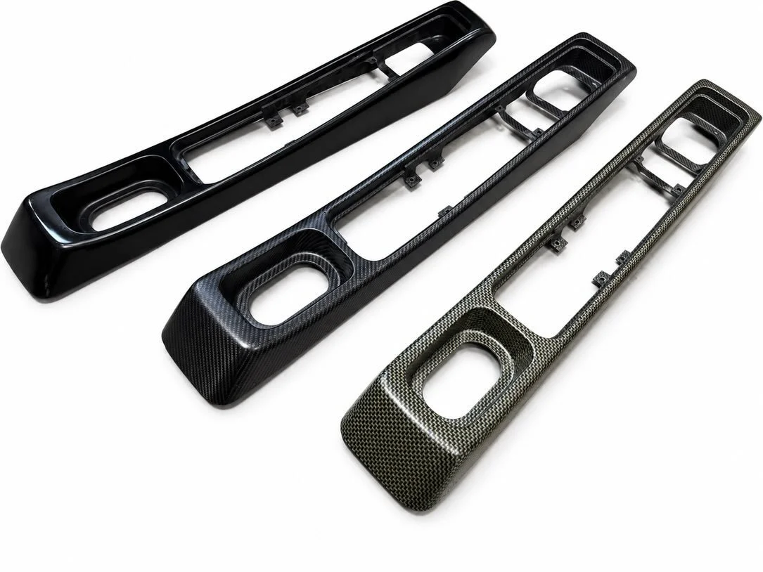 964/993 Short Centre Console

This is a solution for Porsche 964 and 993 owners looking to update their centre console and shift knob allowing the factory integrated boot to be removed. These are supplied in plain black gel coat and are designed to b