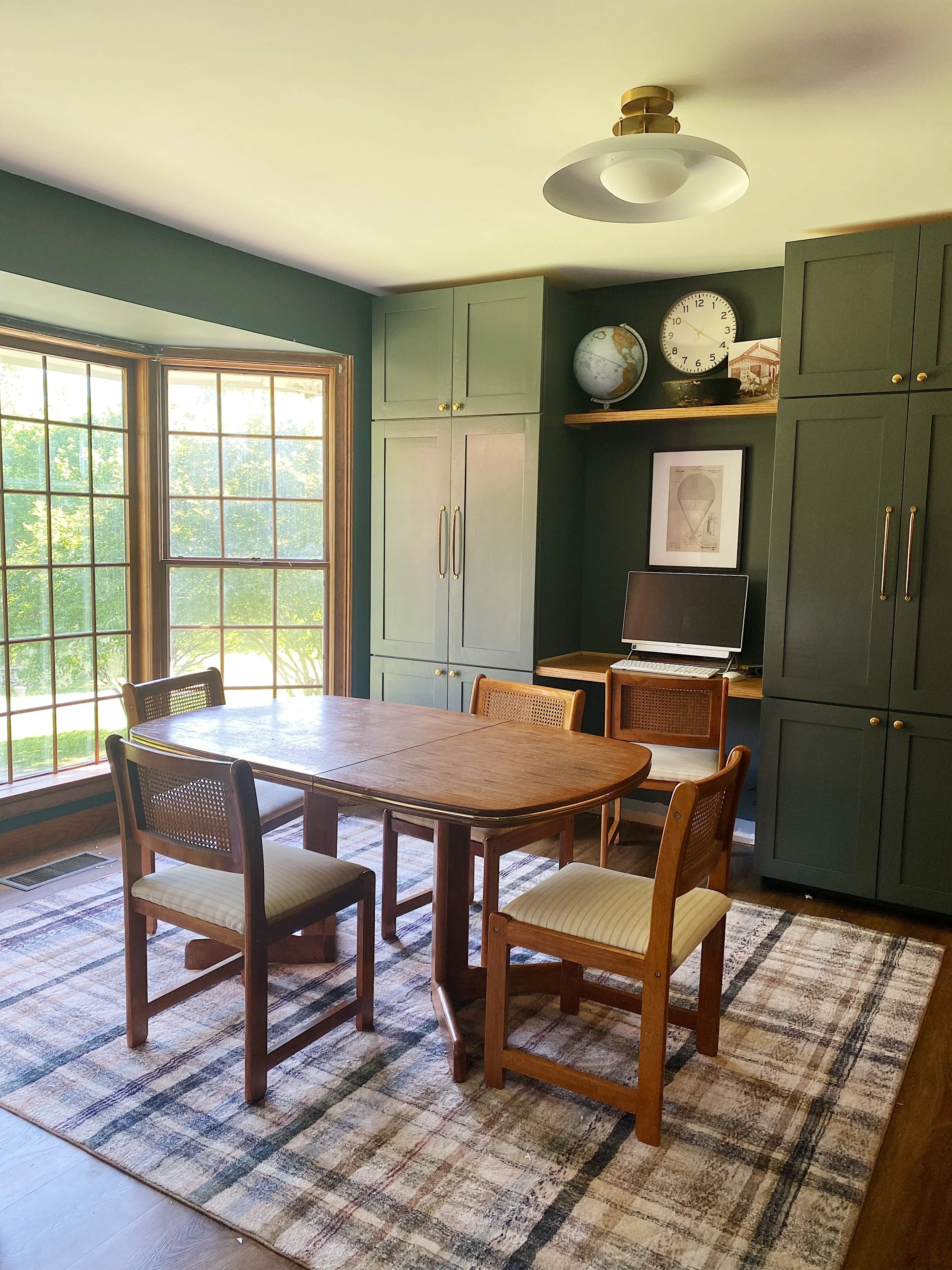 Transforming the dining room to a moody study with built-ins