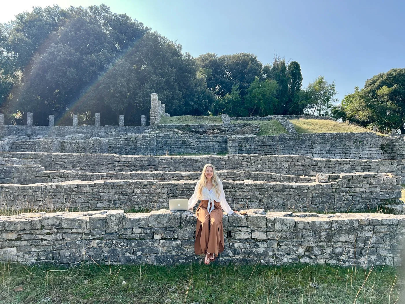 female author with laptop
