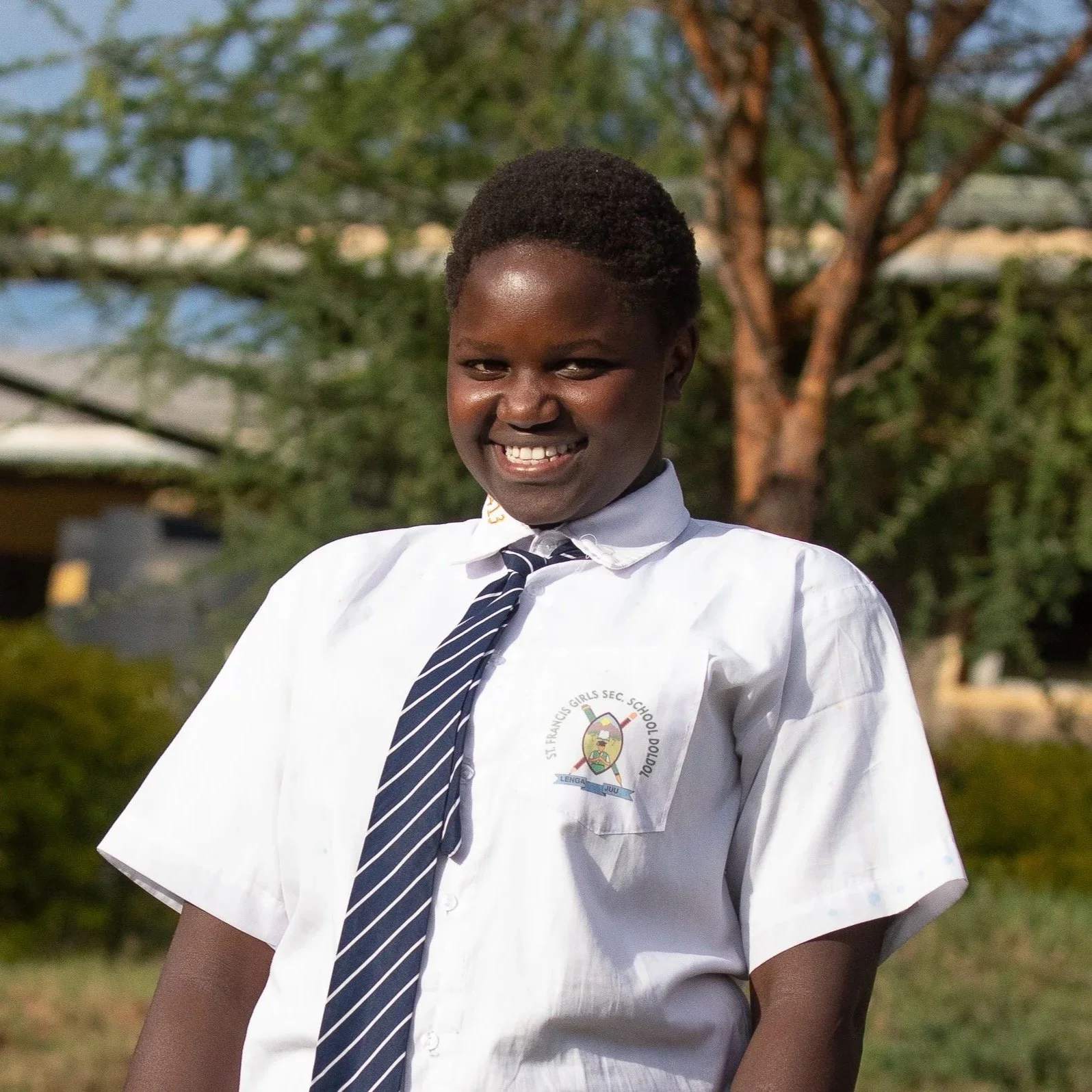 Dorkas Nempiris | Dorkas is 15 years old and describes herself as honest, hardworking and courageous. She enjoys studying history. Fast-forward to beyond college, Dorcas plans to become a lawyer to serve her community.