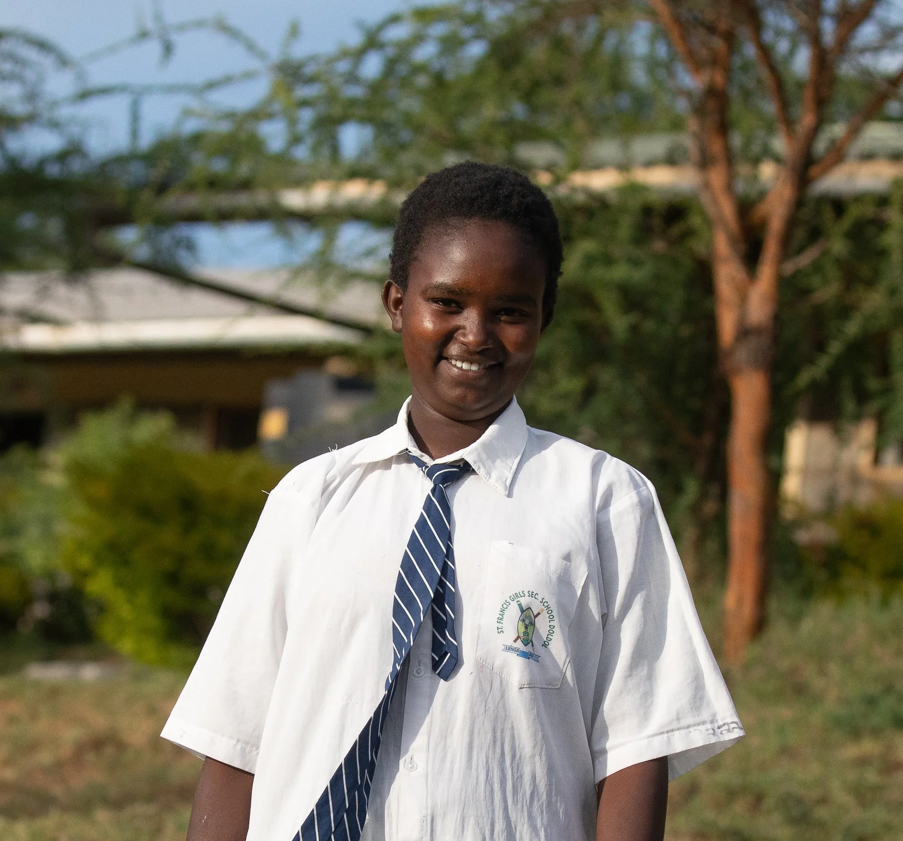 Eunice Nadupoi | Eunice is 16 years old. She is a sophomore in high school and most enjoys studying biology. Eunice wants to become a doctor to save lives and uplift those around her. Eunice’s family is large but only her mother is around, which mean