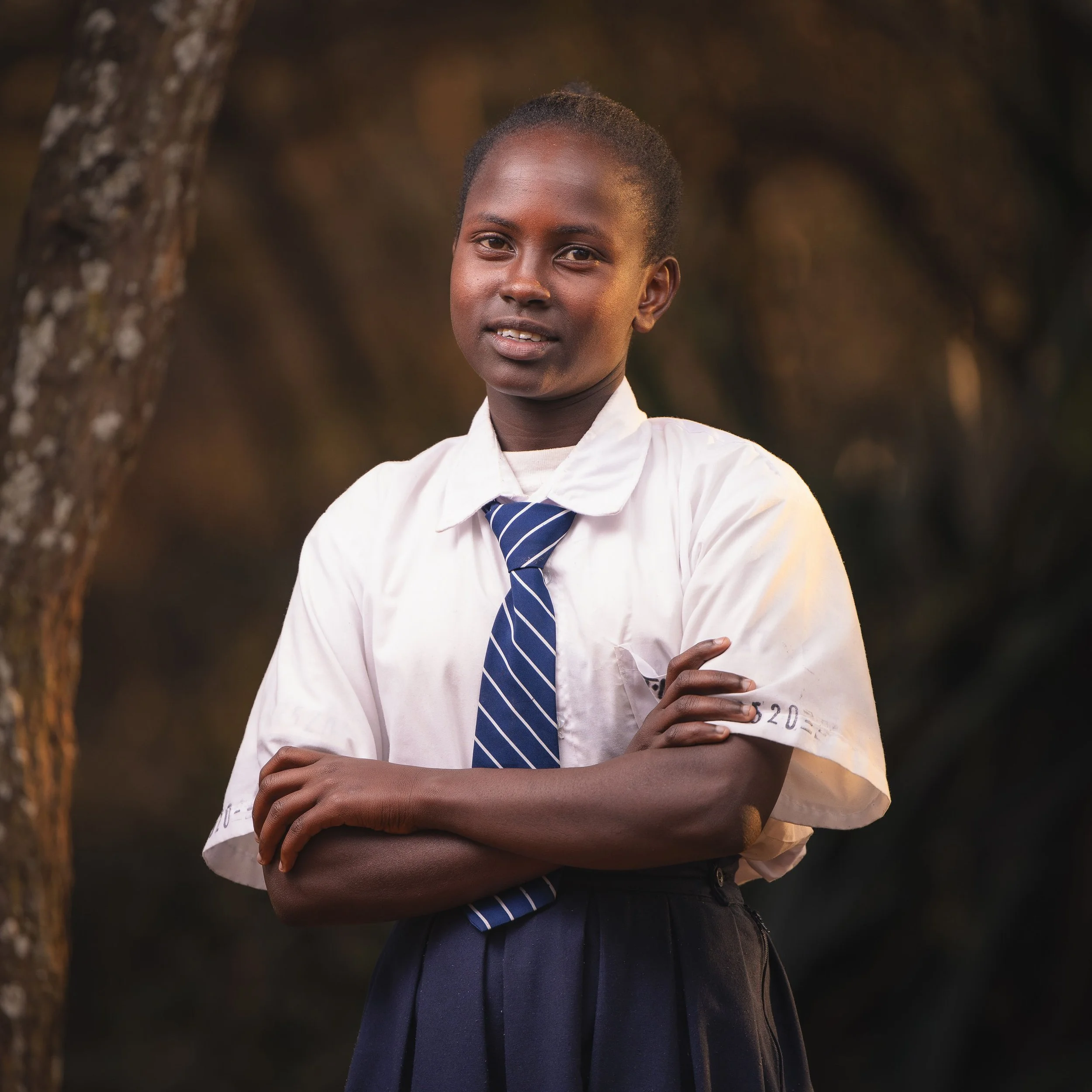 Jecinta Nkaiseri | Jesinta is a Grade 10 student at St. Francis Girls High School. Her favorite subject is Christian Religious Education, and she is a talented athlete who enjoys running, playing football, and reading storybooks.
Jesinta describes he